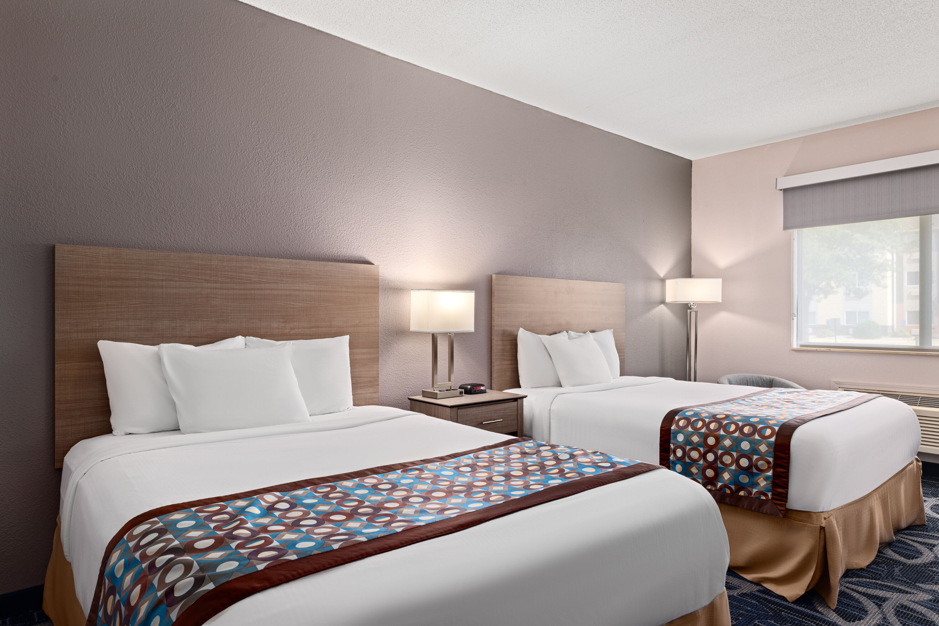 Guest room at the Baymont by Wyndham Waterloo in Waterloo, Iowa