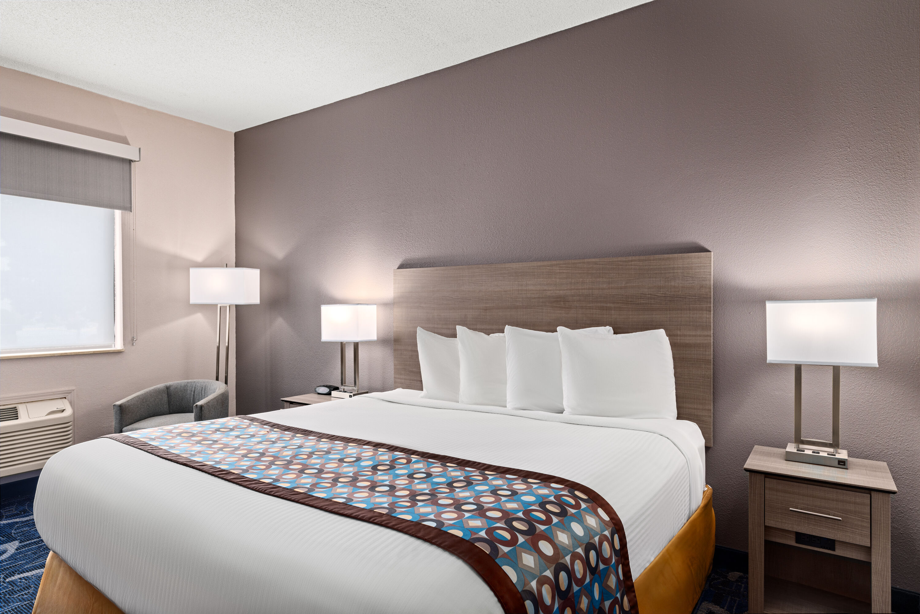Guest room at the Baymont by Wyndham Waterloo in Waterloo, Iowa