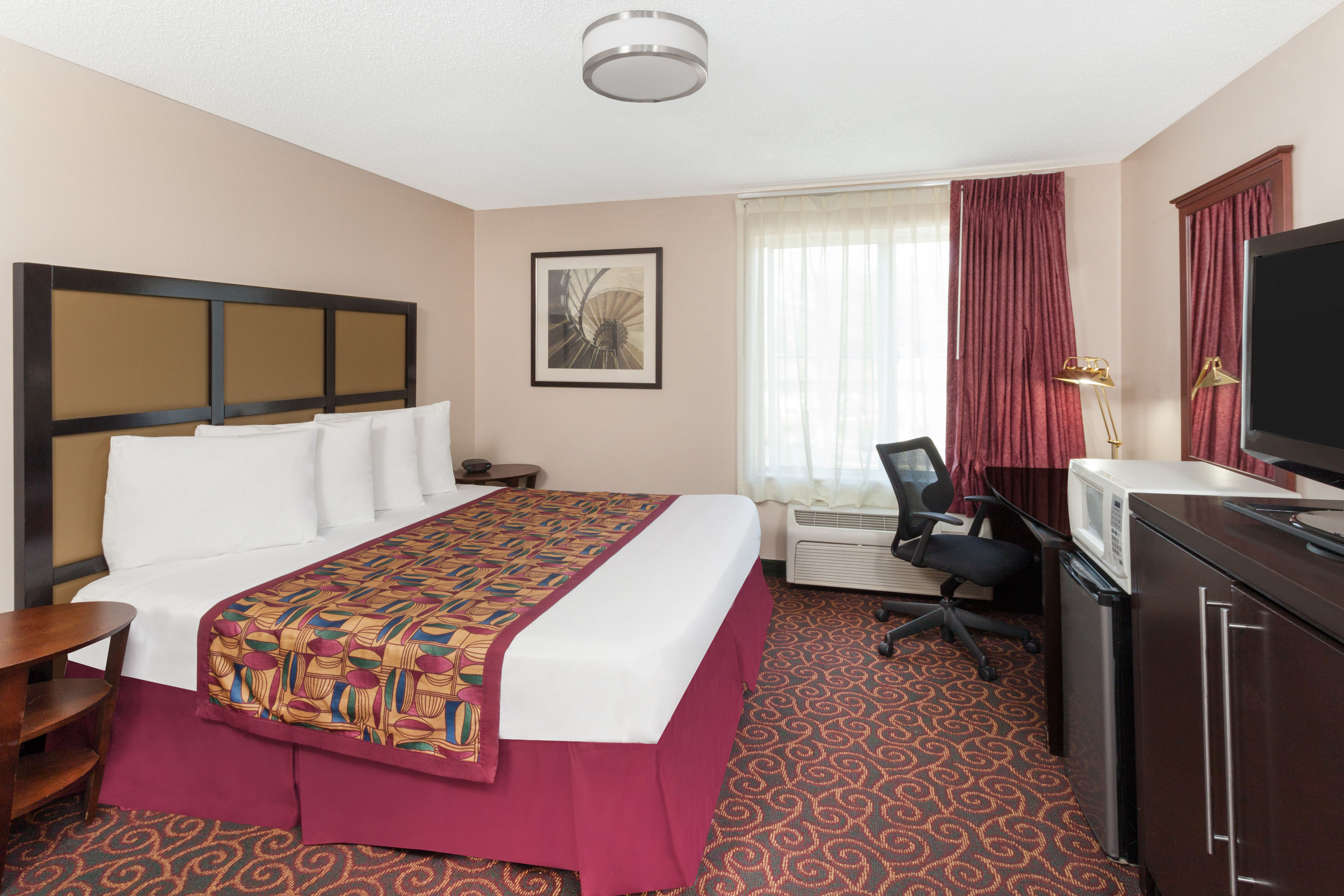 Guest room at the Baymont by Wyndham Chicago/Calumet City in Calumet City, Illinois