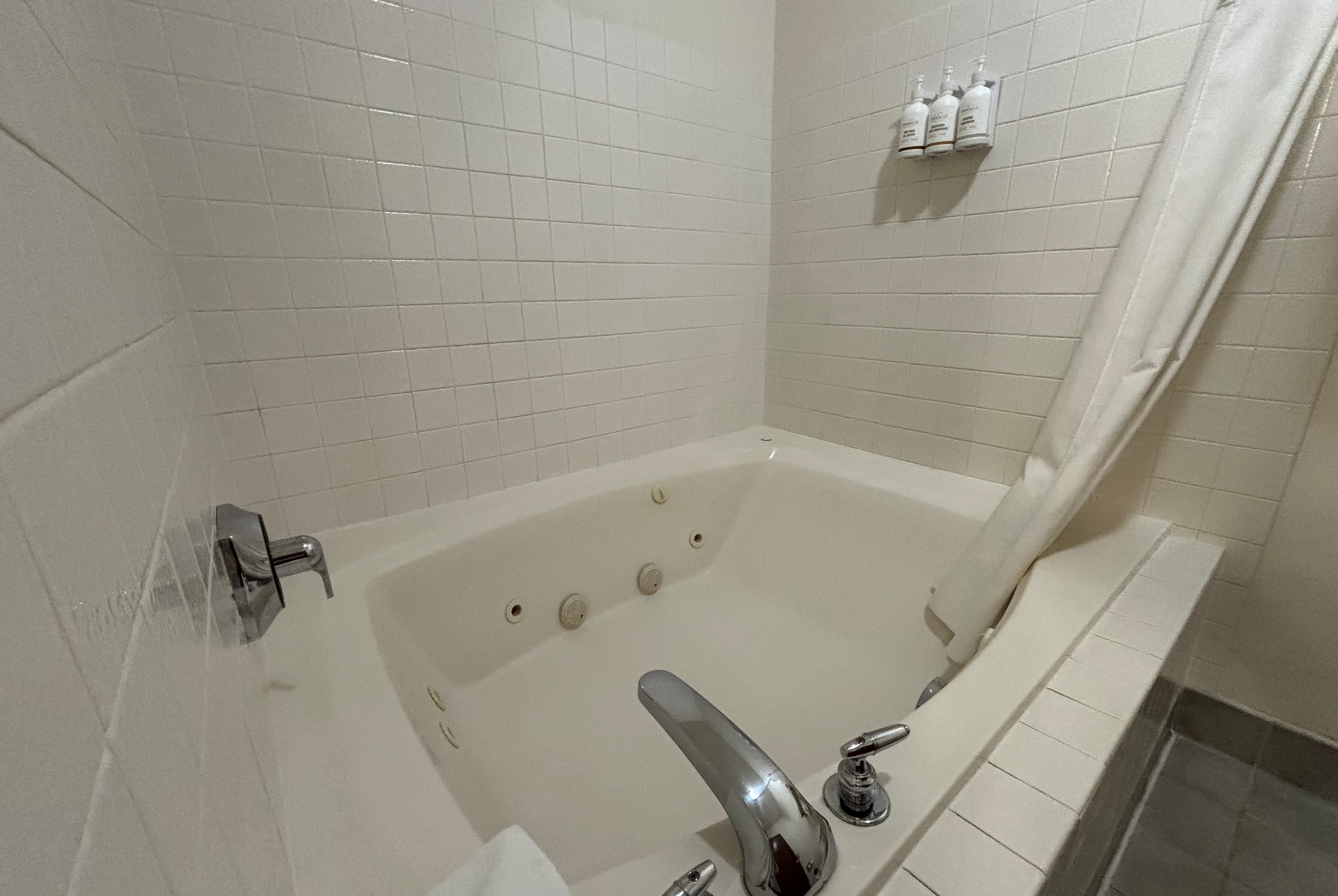 Guest room bath at the Baymont by Wyndham Decatur IL North in Decatur, Illinois