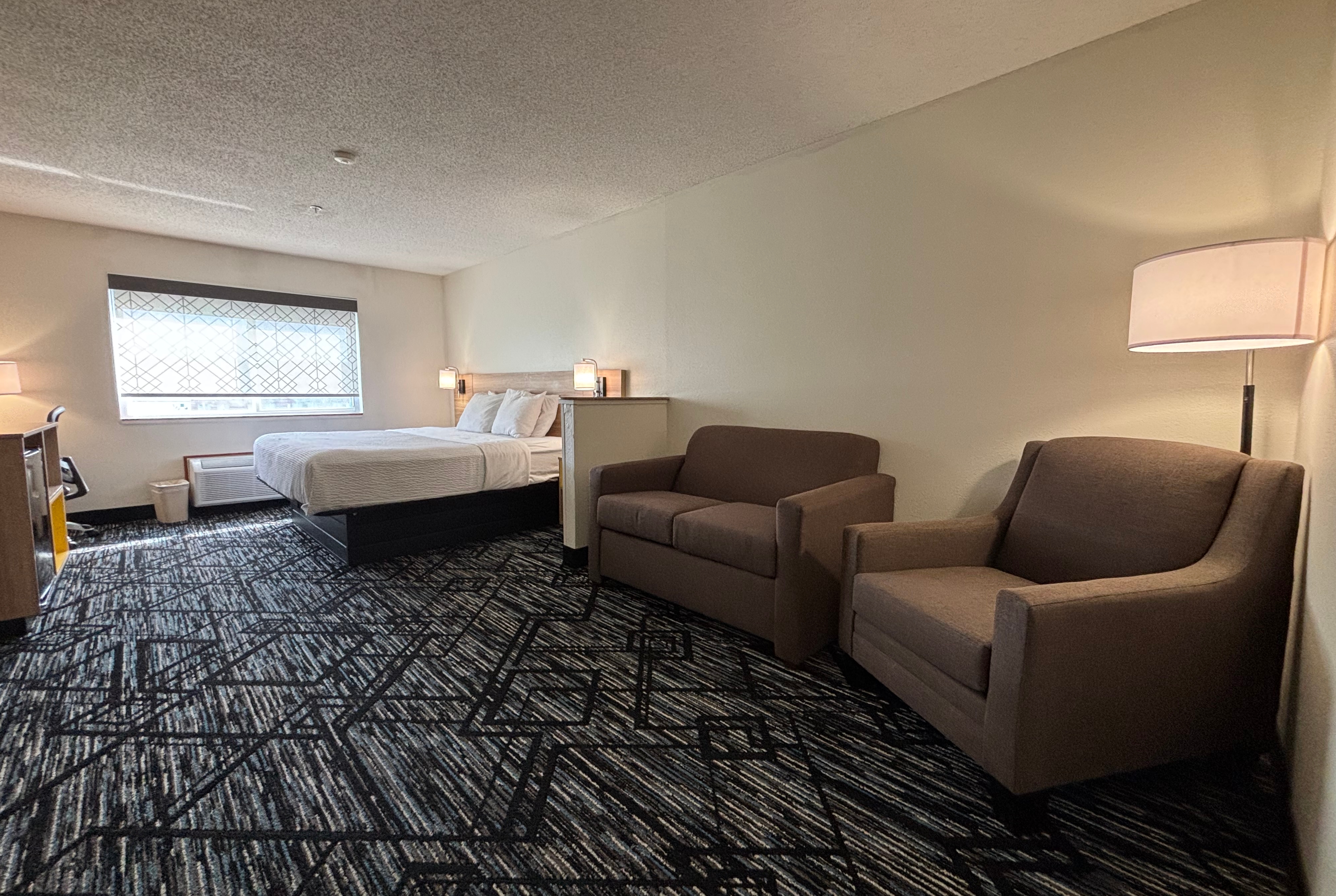 King bed guest room at the Baymont by Wyndham Decatur IL North in Decatur, Illinois