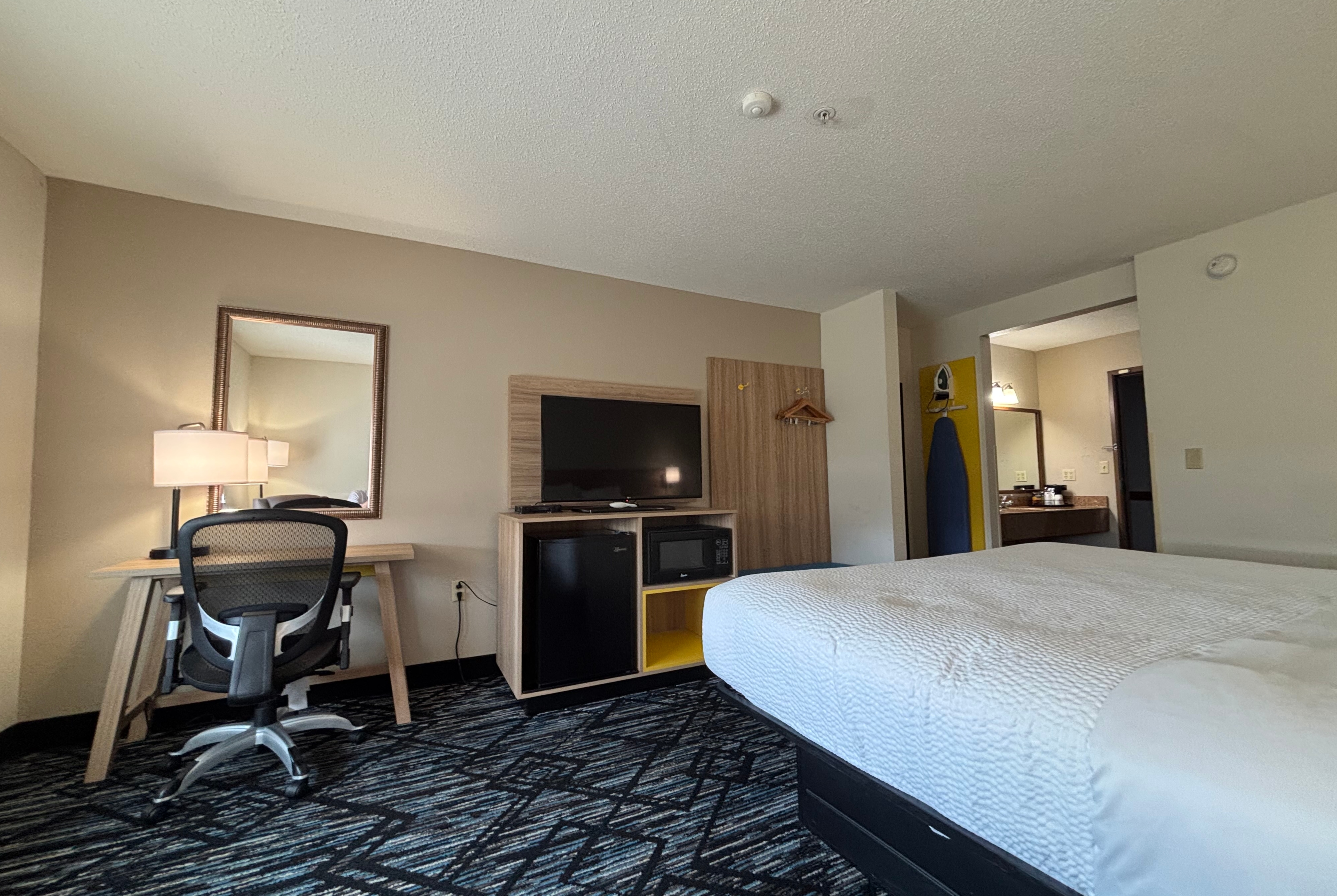 King bed guest room at the Baymont by Wyndham Decatur IL North in Decatur, Illinois