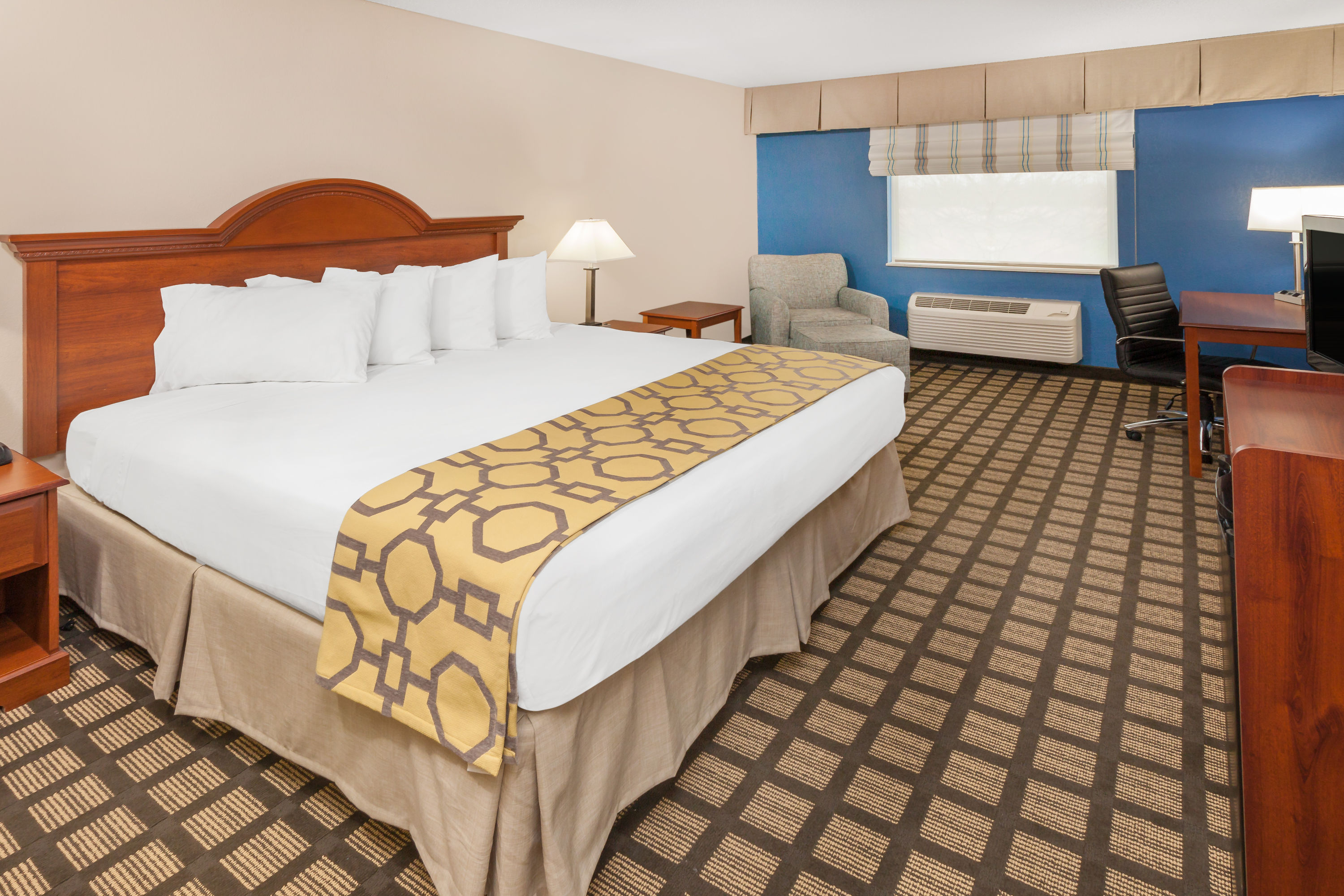 Guest room at the Baymont by Wyndham Galesburg in Galesburg, Illinois