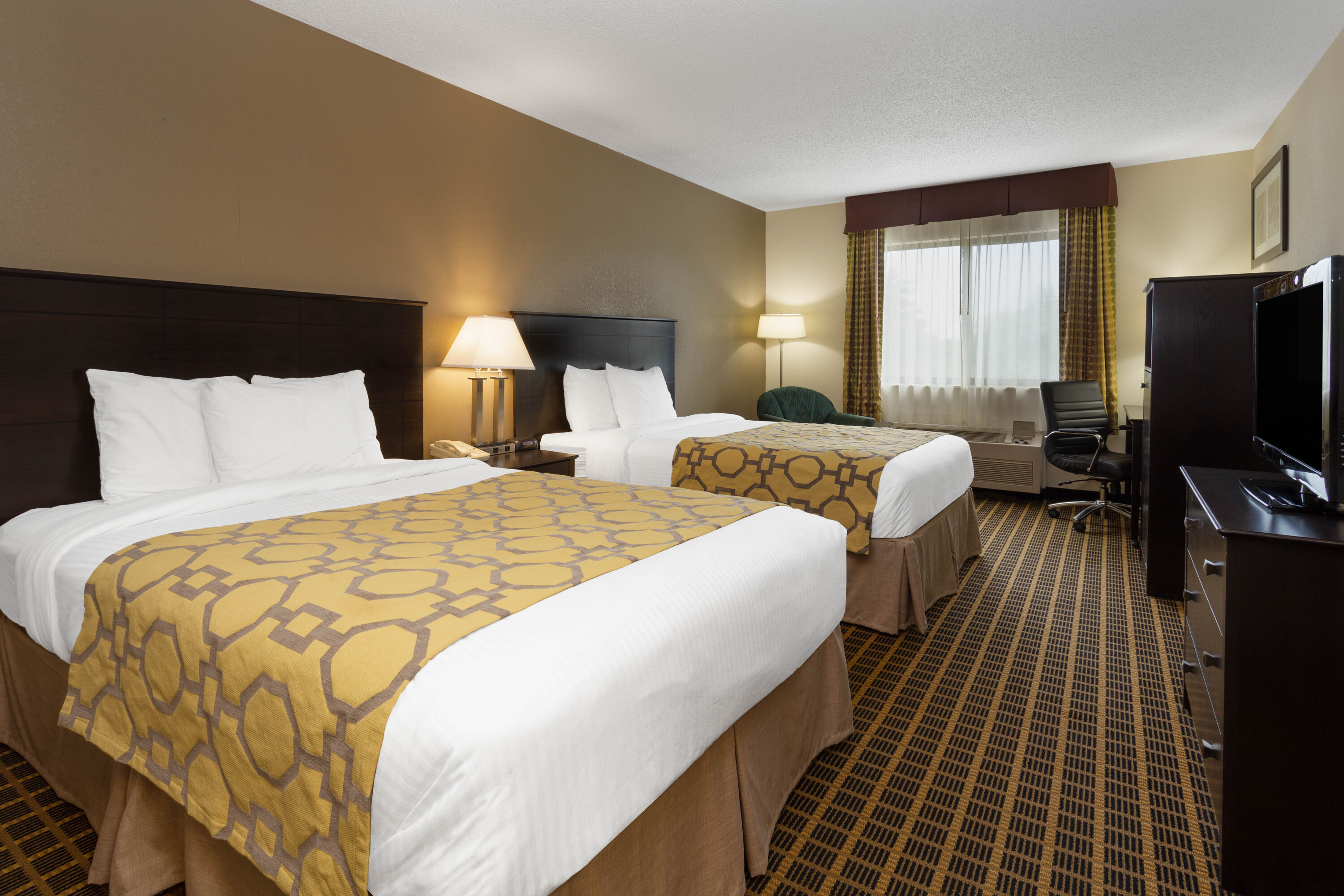 Guest room at the Baymont by Wyndham Harvard in Harvard, Illinois