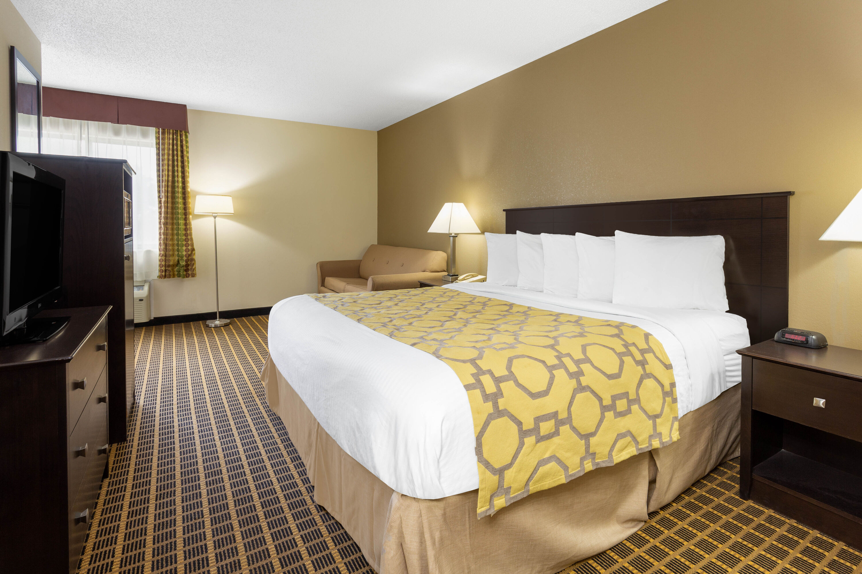 Guest room at the Baymont by Wyndham Harvard in Harvard, Illinois