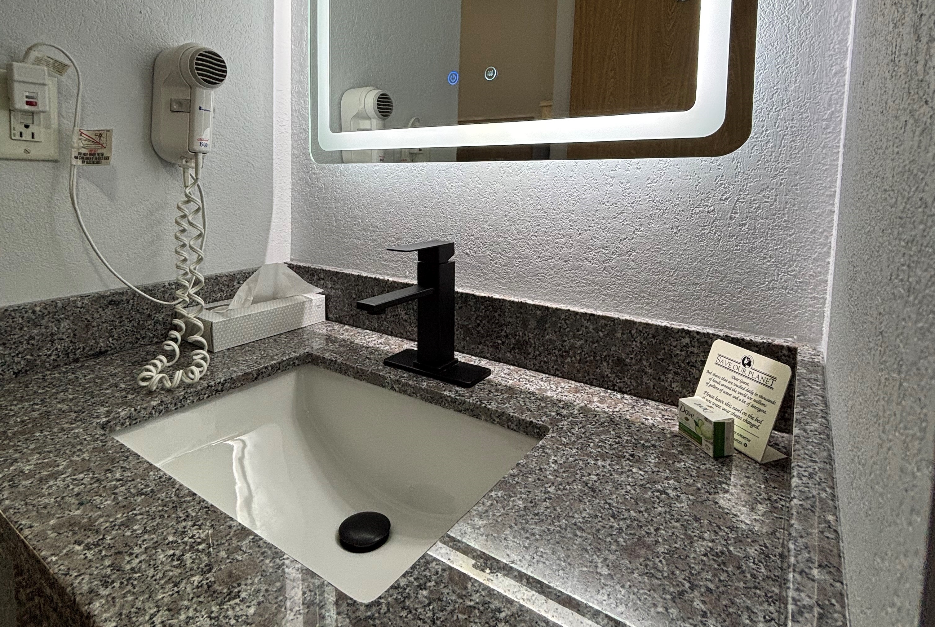 Guest room at the Baymont by Wyndham Jacksonville in Jacksonville, Illinois