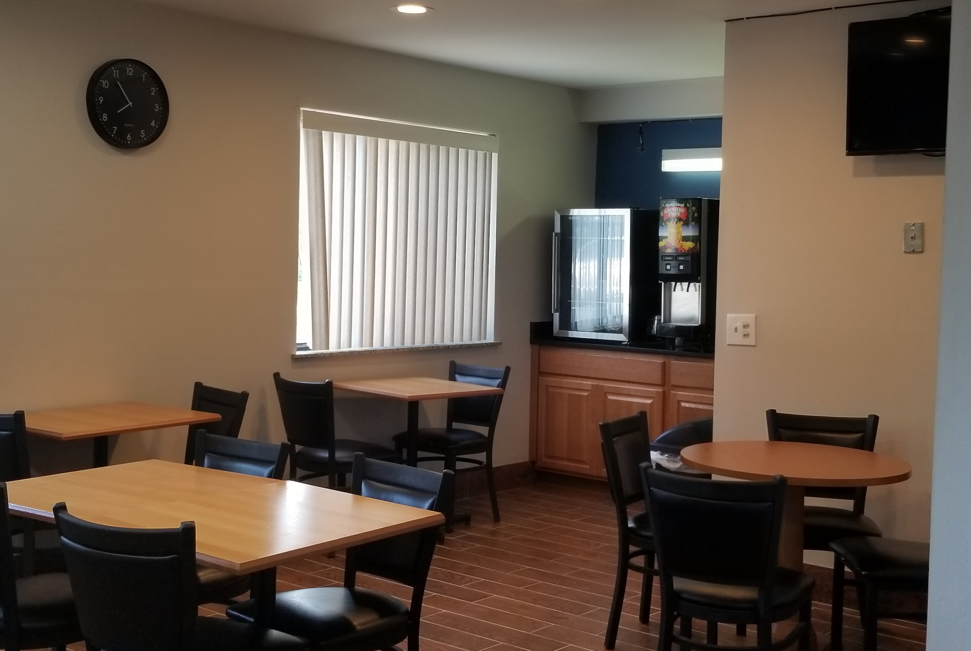Baymont Inn & Suites by Wyndham Richmond restaurant breakfast area with seating in Richmond, Illinois
