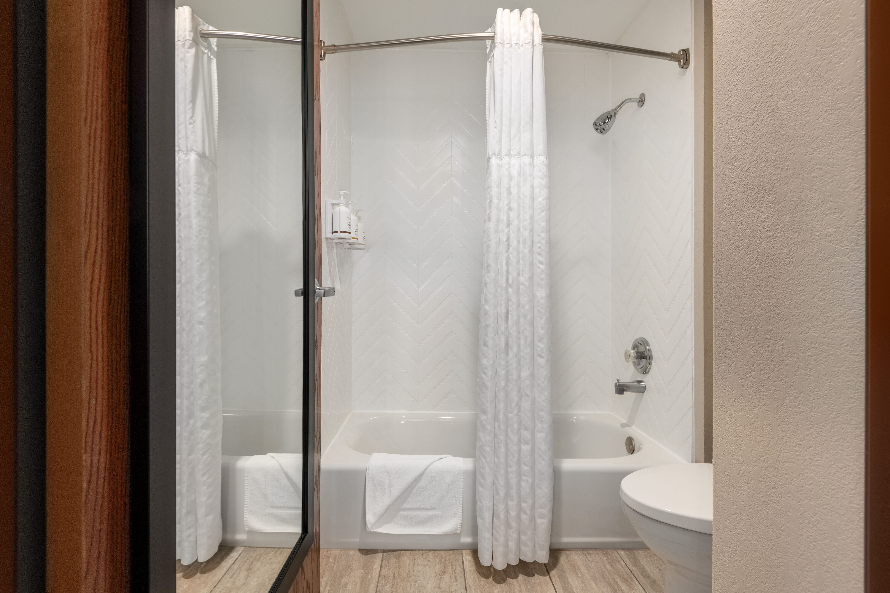 Guest room bath at the Baymont by Wyndham Rockford in Rockford, Illinois