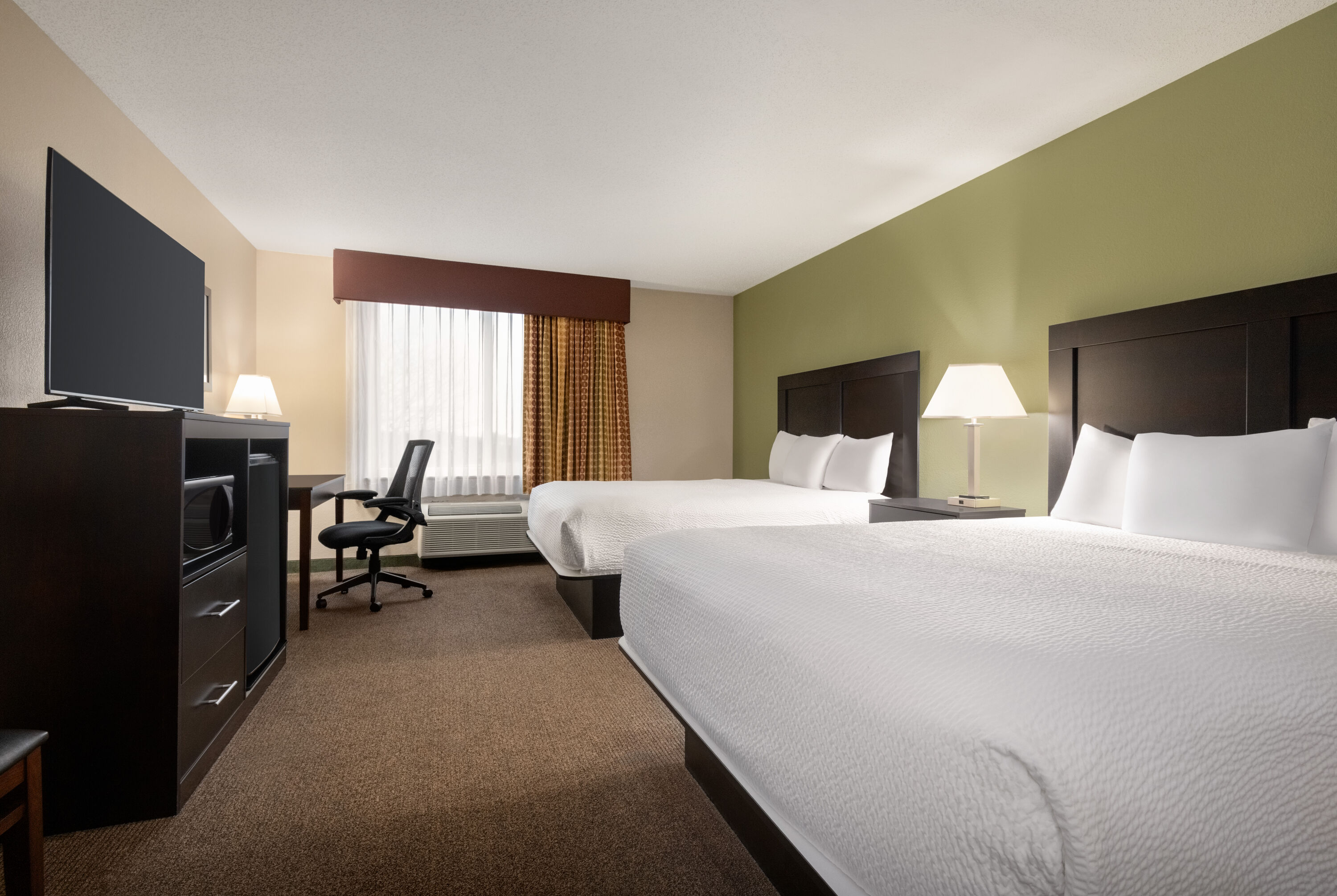Guest room at the Baymont by Wyndham Rockford in Rockford, Illinois