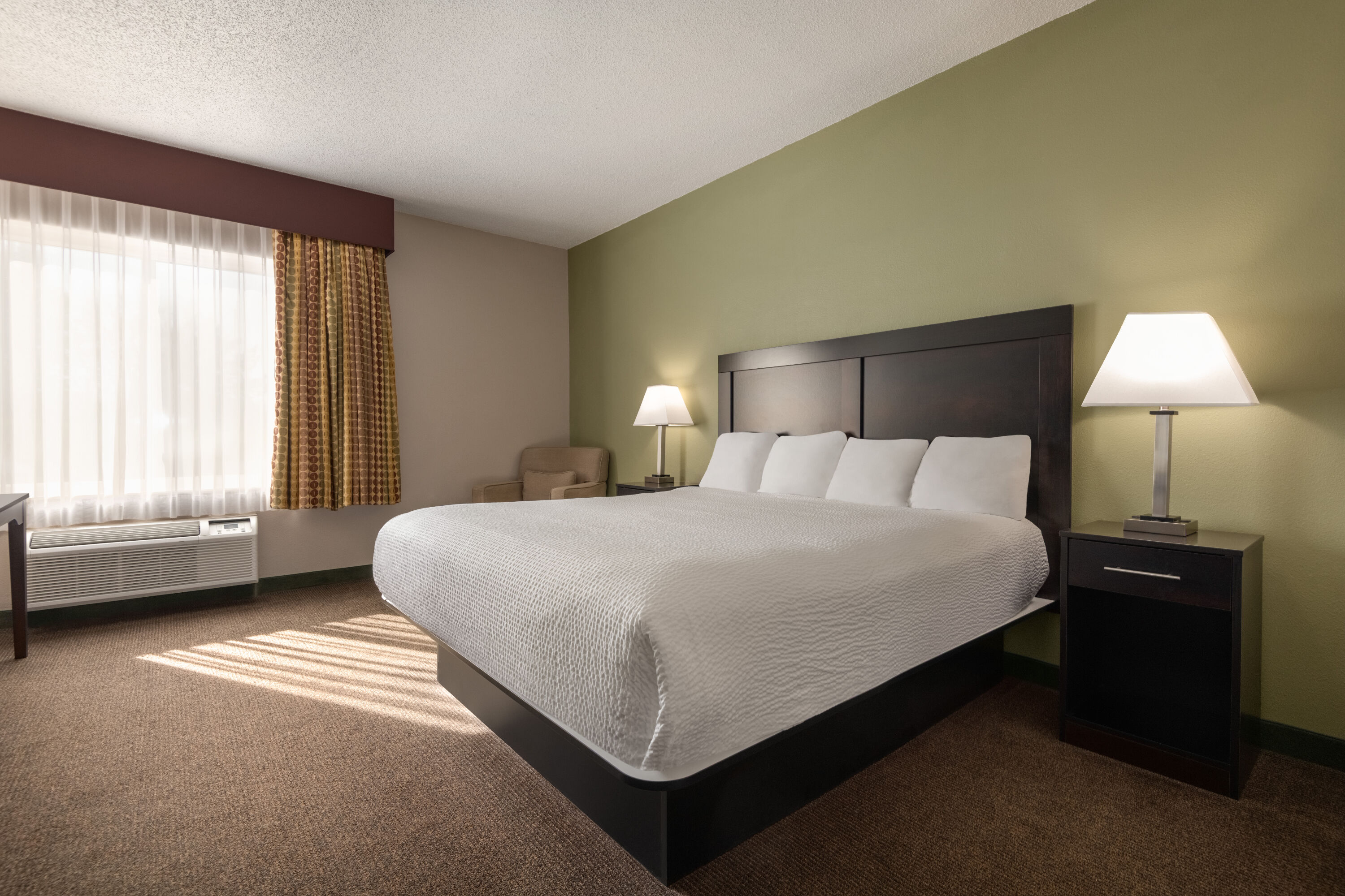 Guest room at the Baymont by Wyndham Rockford in Rockford, Illinois