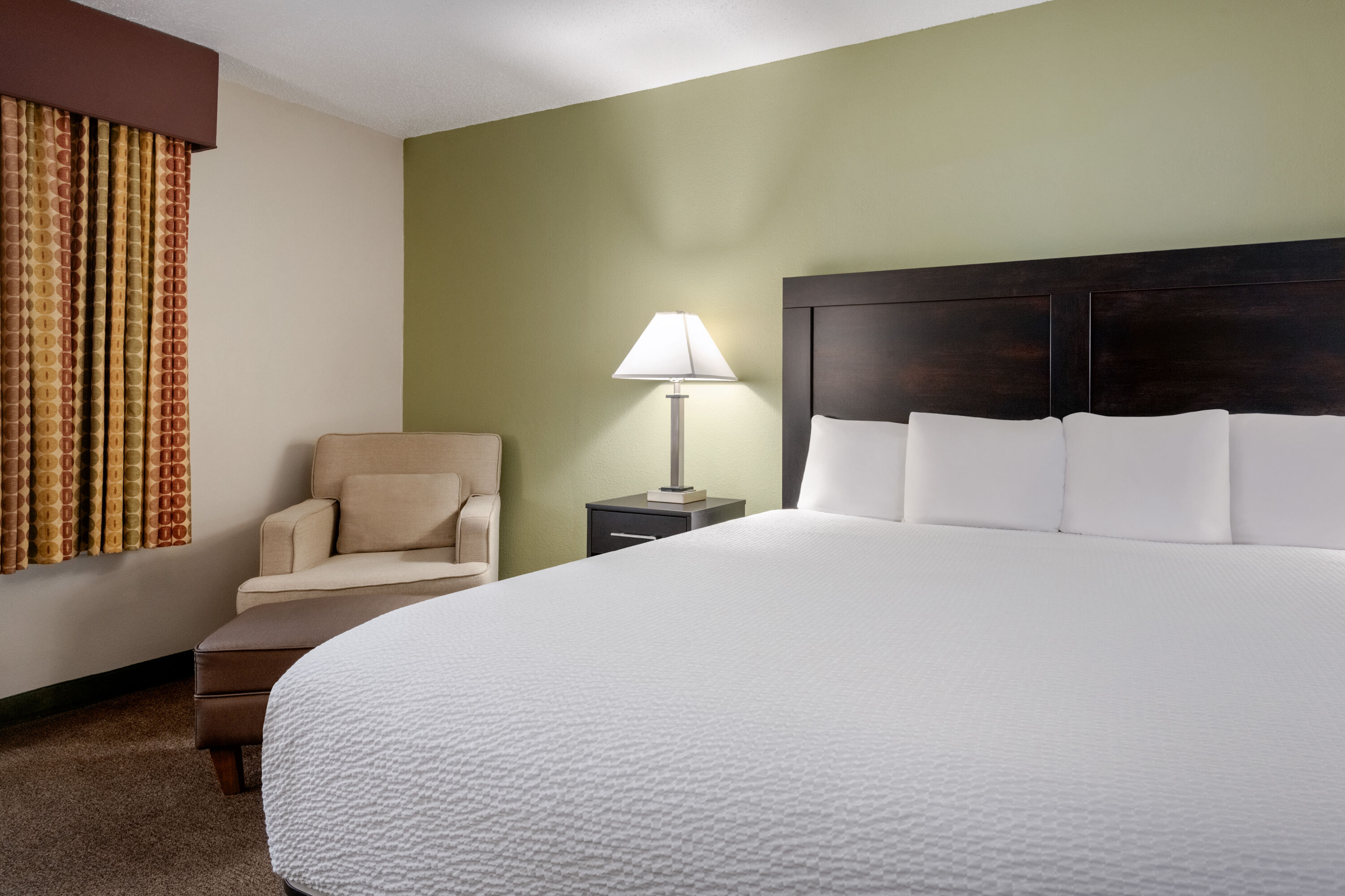 Guest room at the Baymont by Wyndham Rockford in Rockford, Illinois