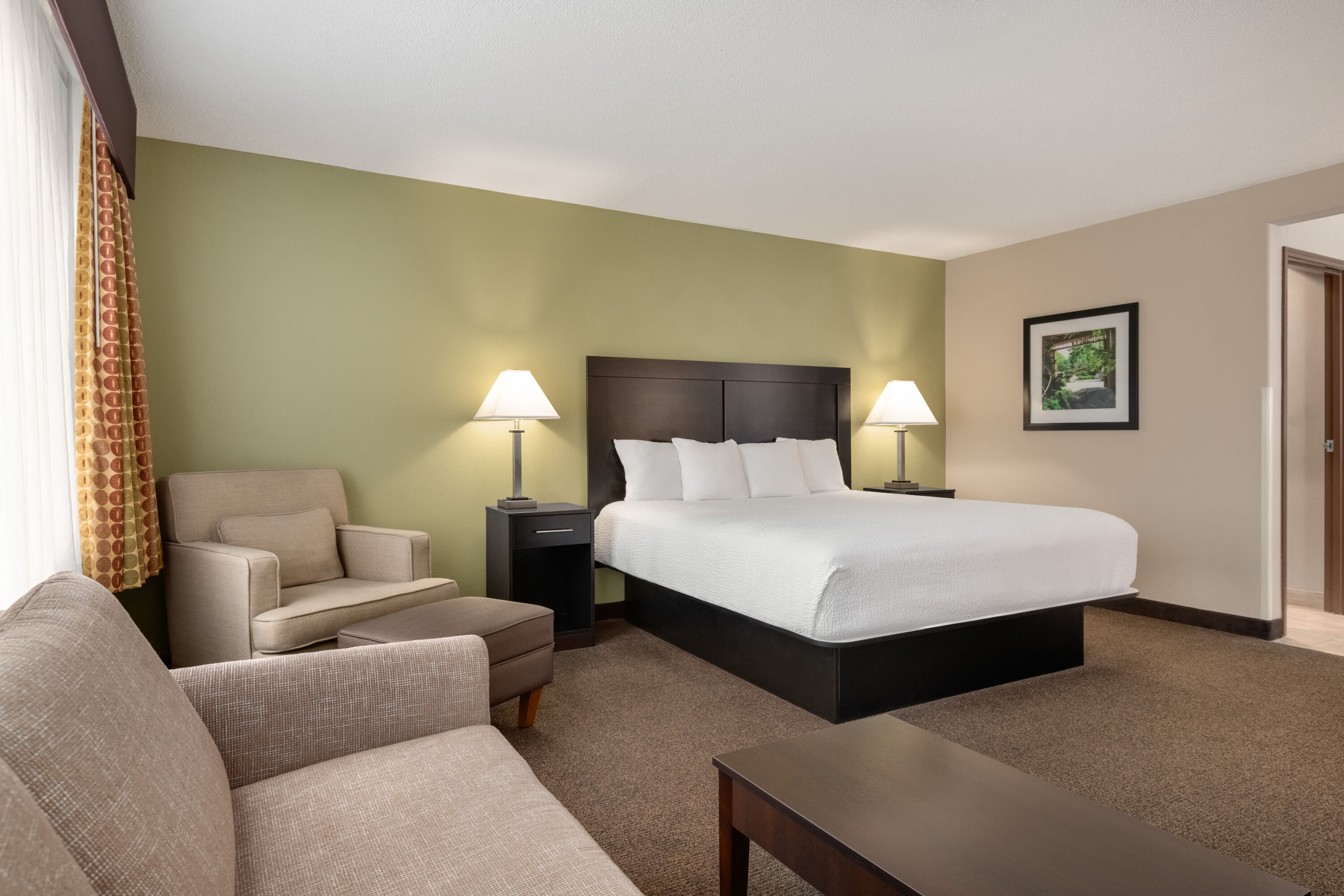 Guest room at the Baymont by Wyndham Rockford in Rockford, Illinois