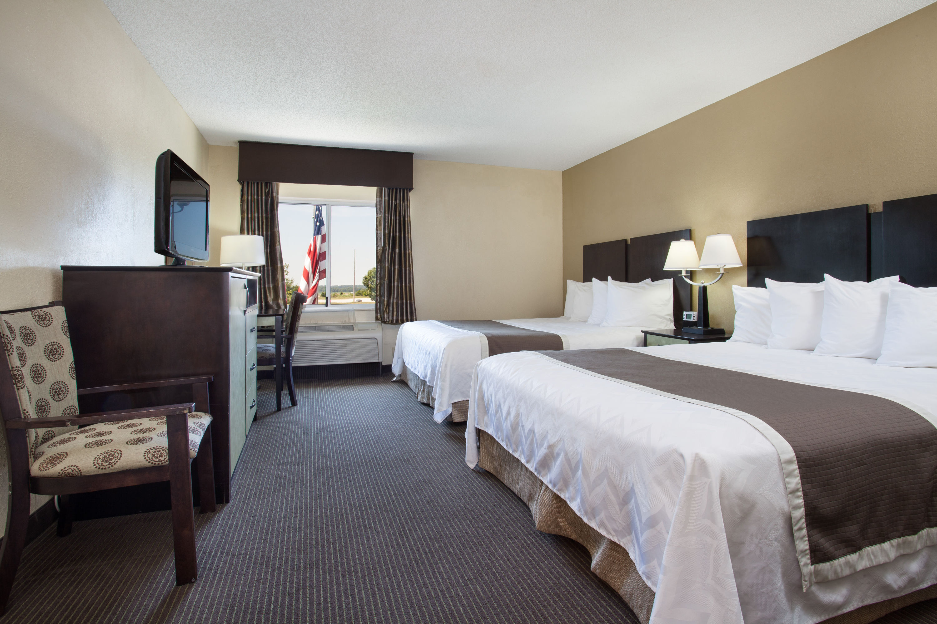 Guest room at the Baymont by Wyndham Dale in Dale, Indiana