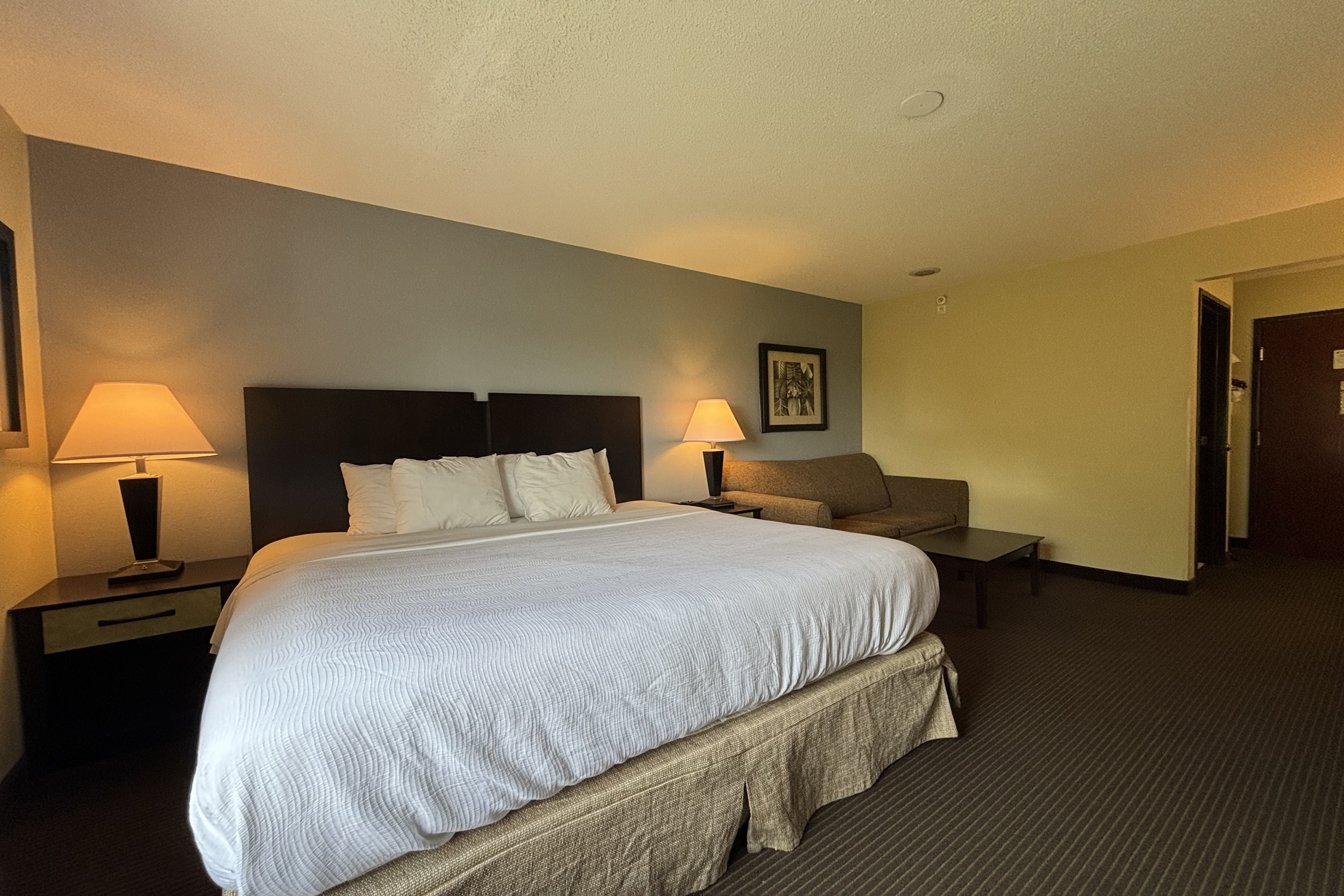 Guest room at the Baymont by Wyndham Dale in Dale, Indiana