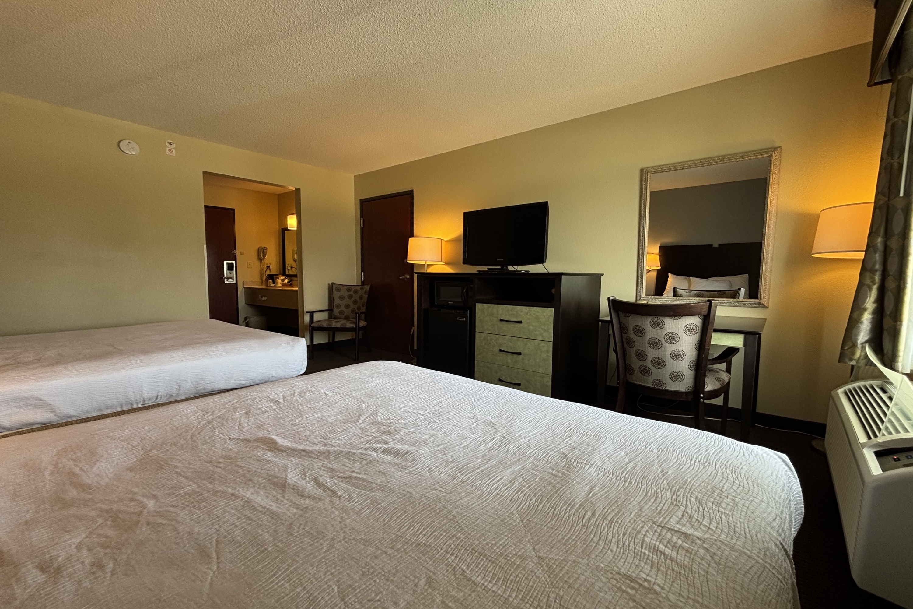 Guest room at the Baymont by Wyndham Dale in Dale, Indiana