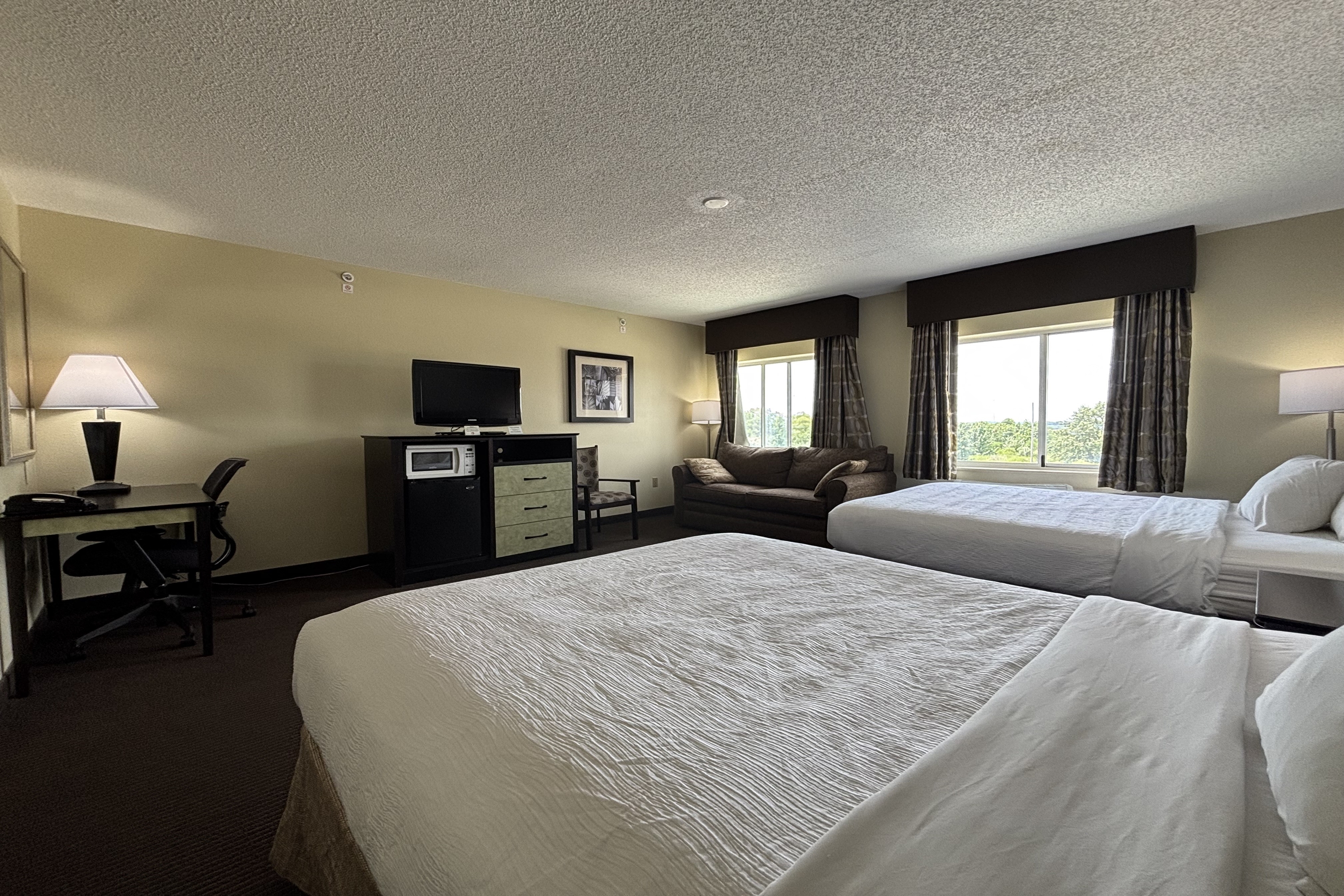 Guest room at the Baymont by Wyndham Dale in Dale, Indiana