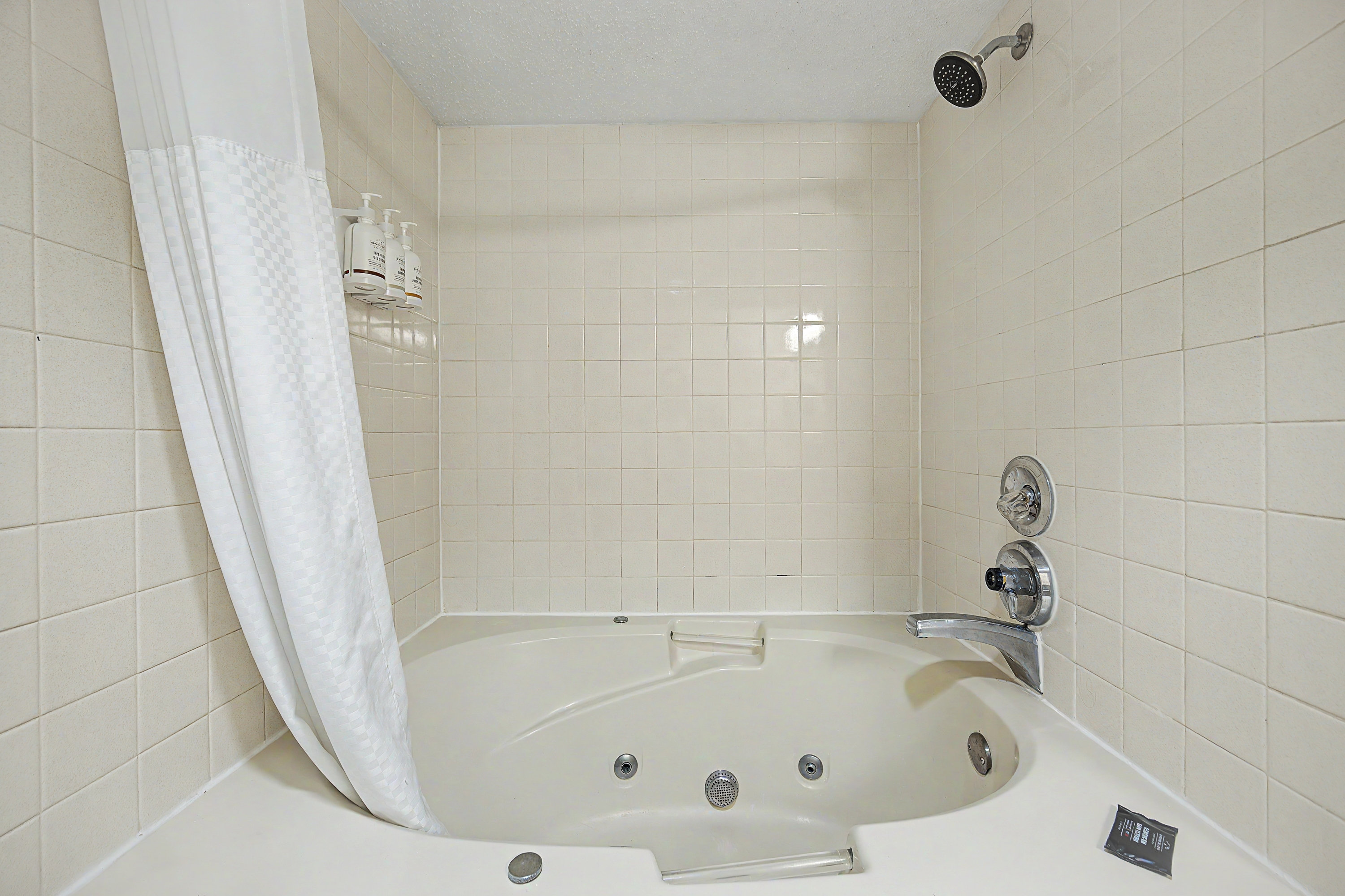 Guest room bath at the Baymont by Wyndham Greensburg in Greensburg, Indiana
