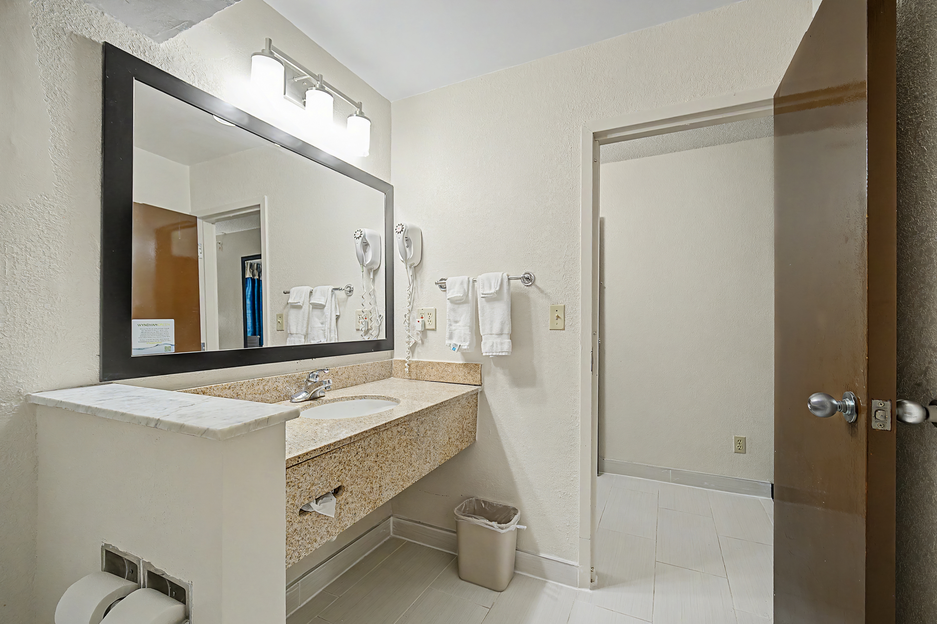 Guest room bath at the Baymont by Wyndham Greensburg in Greensburg, Indiana
