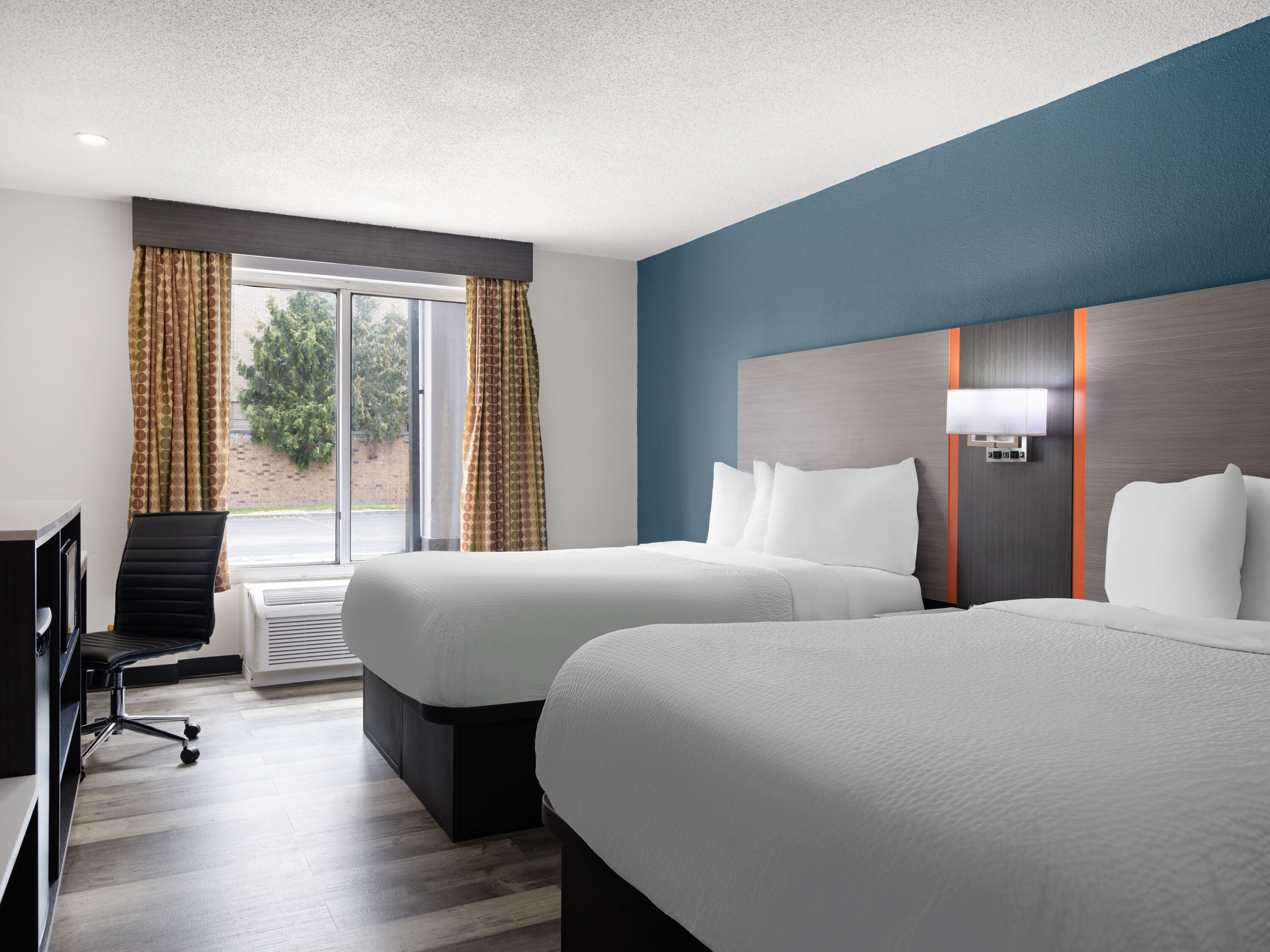 Guest room at the Baymont by Wyndham Indianapolis East in Indianapolis, Indiana