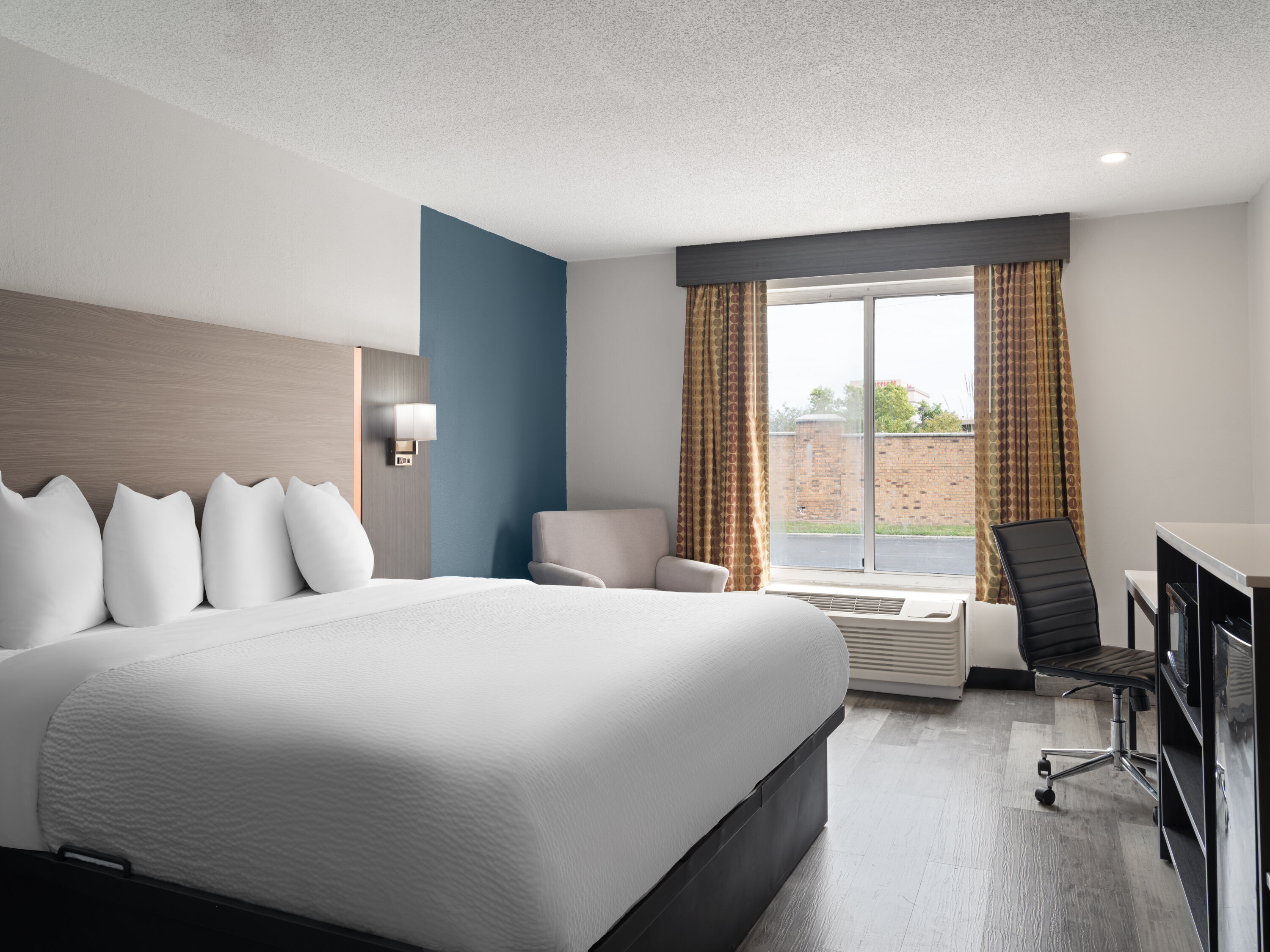 Guest room at the Baymont by Wyndham Indianapolis East in Indianapolis, Indiana