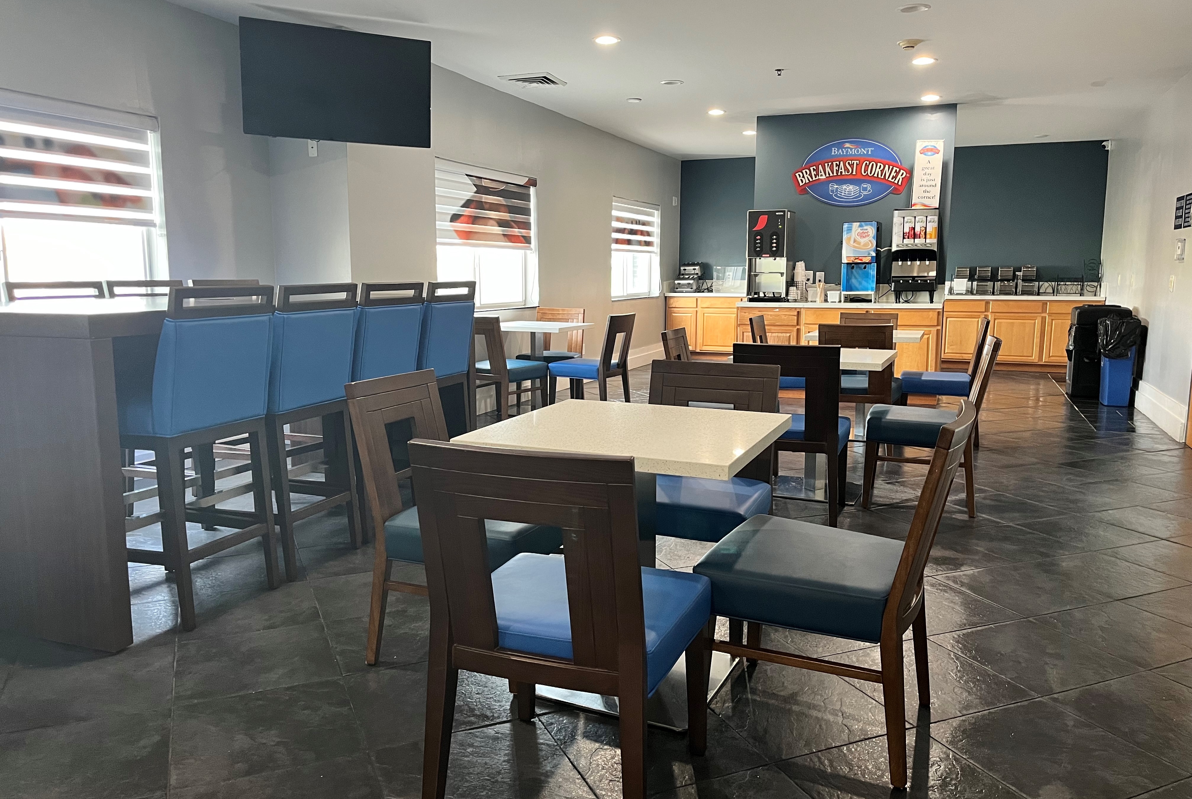 Baymont by Wyndham Indianapolis Northeast restaurant breakfast area with seating in Indianapolis, Indiana