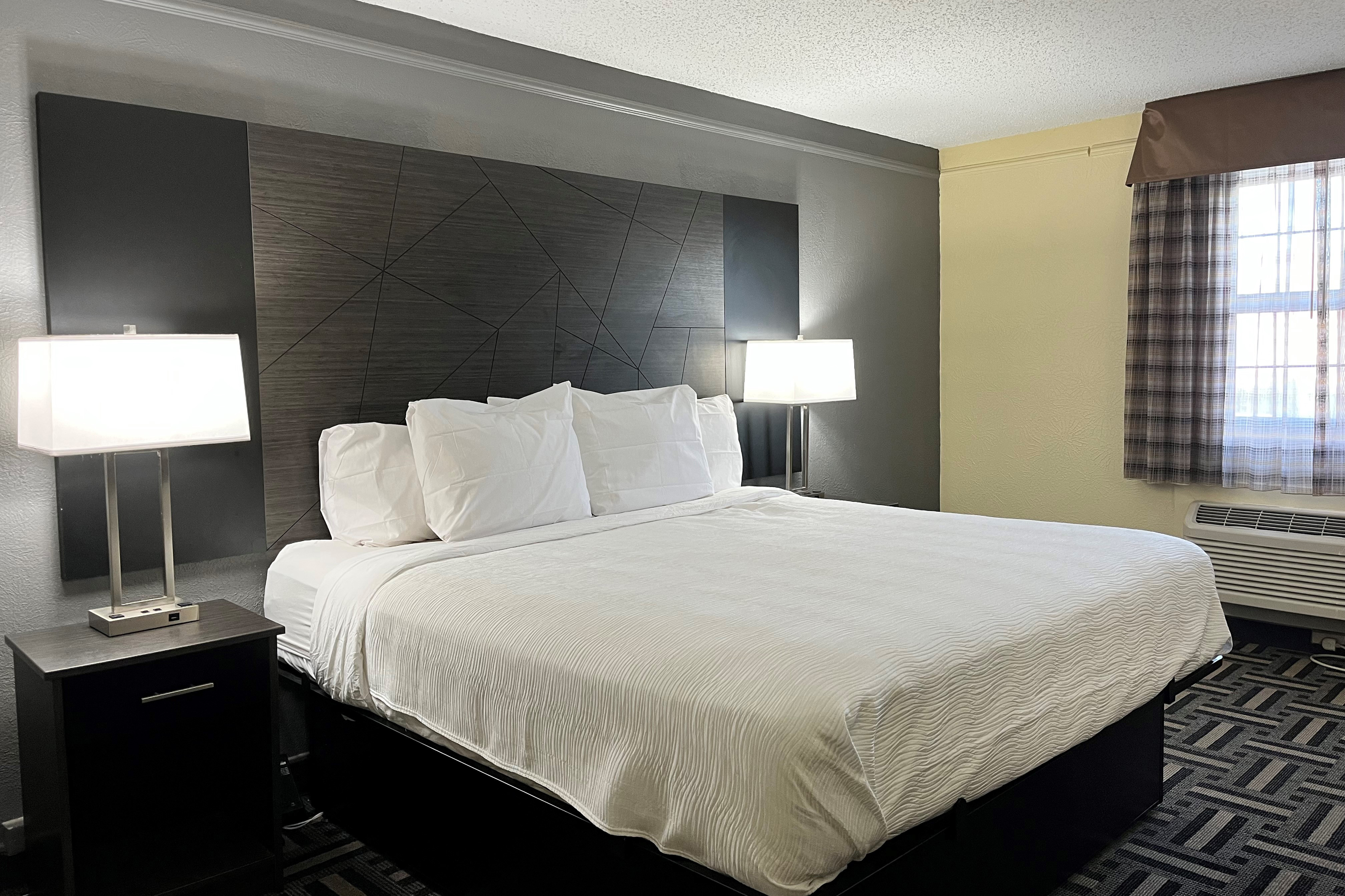 Guest room at the Baymont by Wyndham Indianapolis Airport Lynhurst in Indianapolis, Indiana