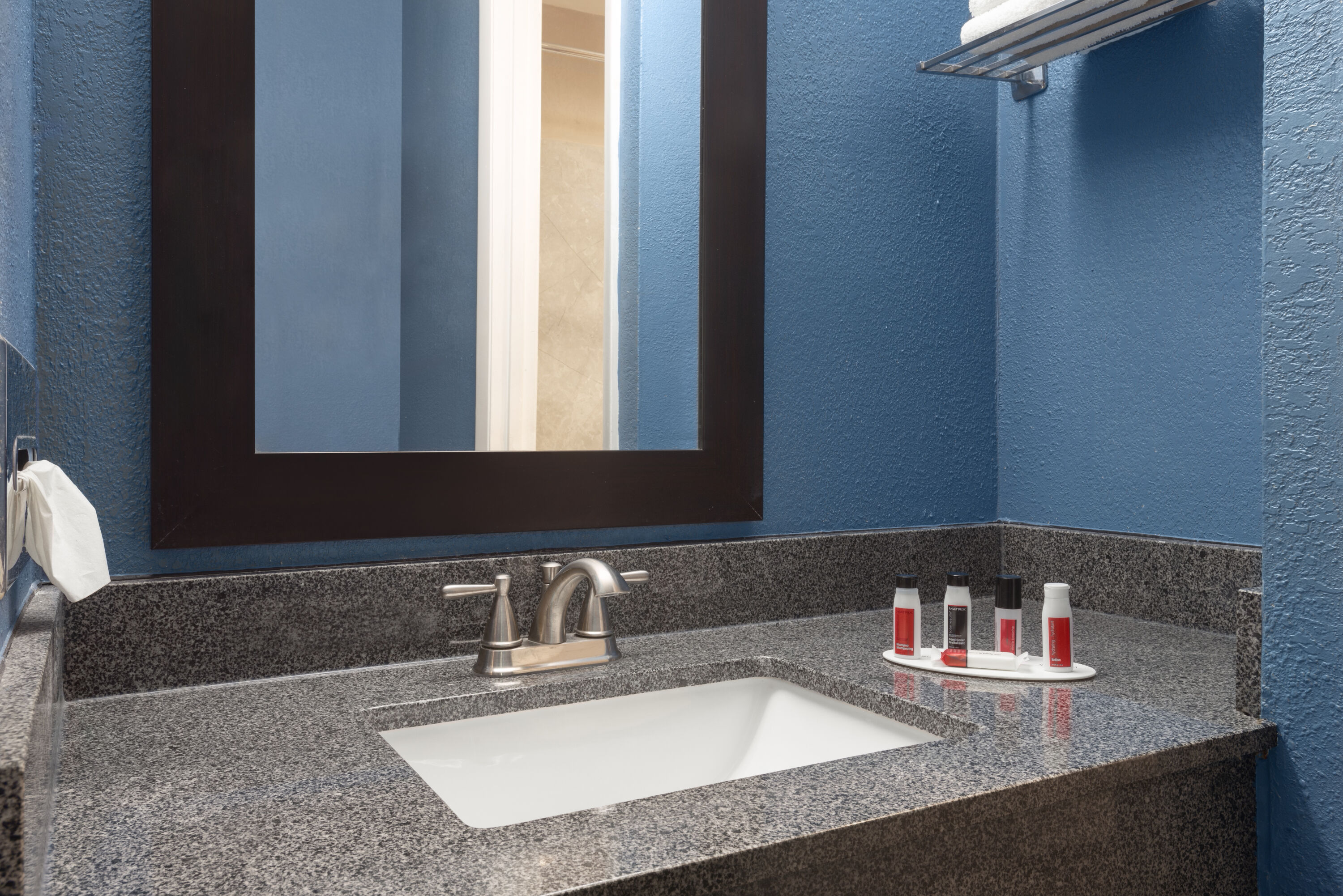 Guest room bath at the Baymont by Wyndham Muncie Near Ball State University in Muncie, Indiana