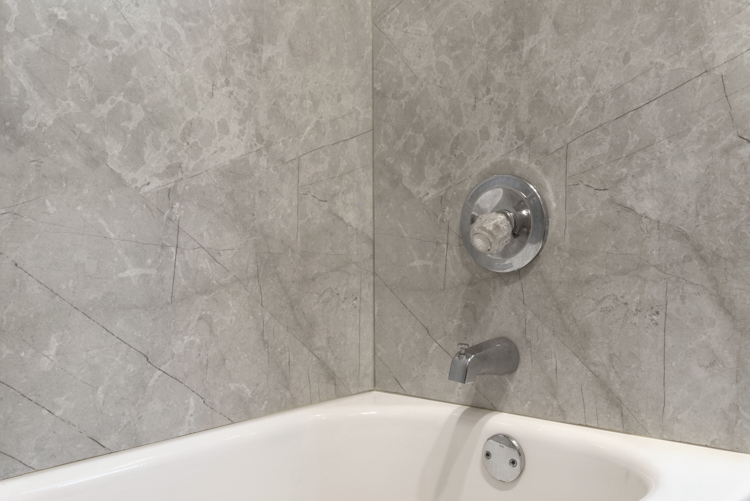 Guest room bath at the Baymont by Wyndham Muncie Near Ball State University in Muncie, Indiana