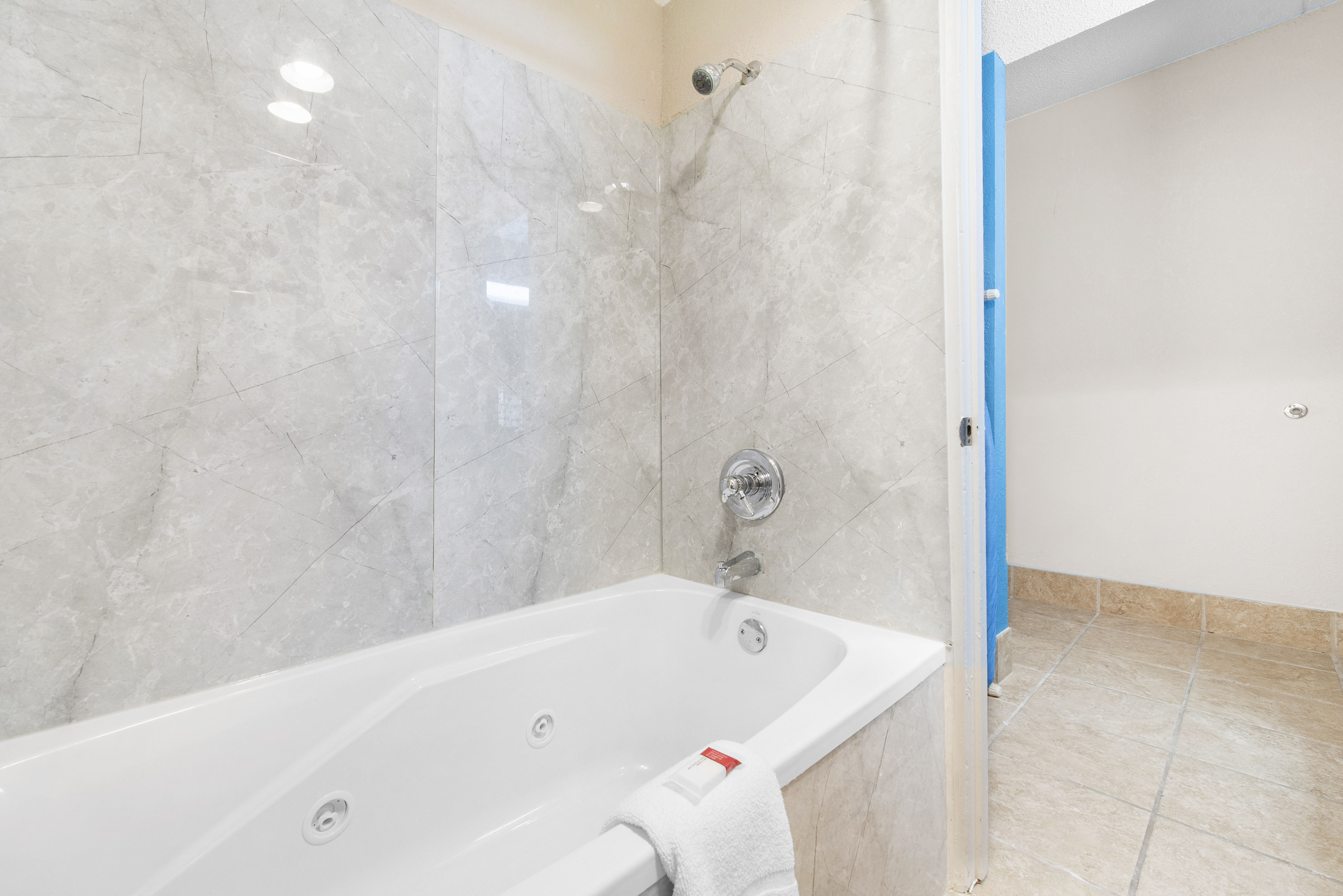 Guest room bath at the Baymont by Wyndham Muncie Near Ball State University in Muncie, Indiana