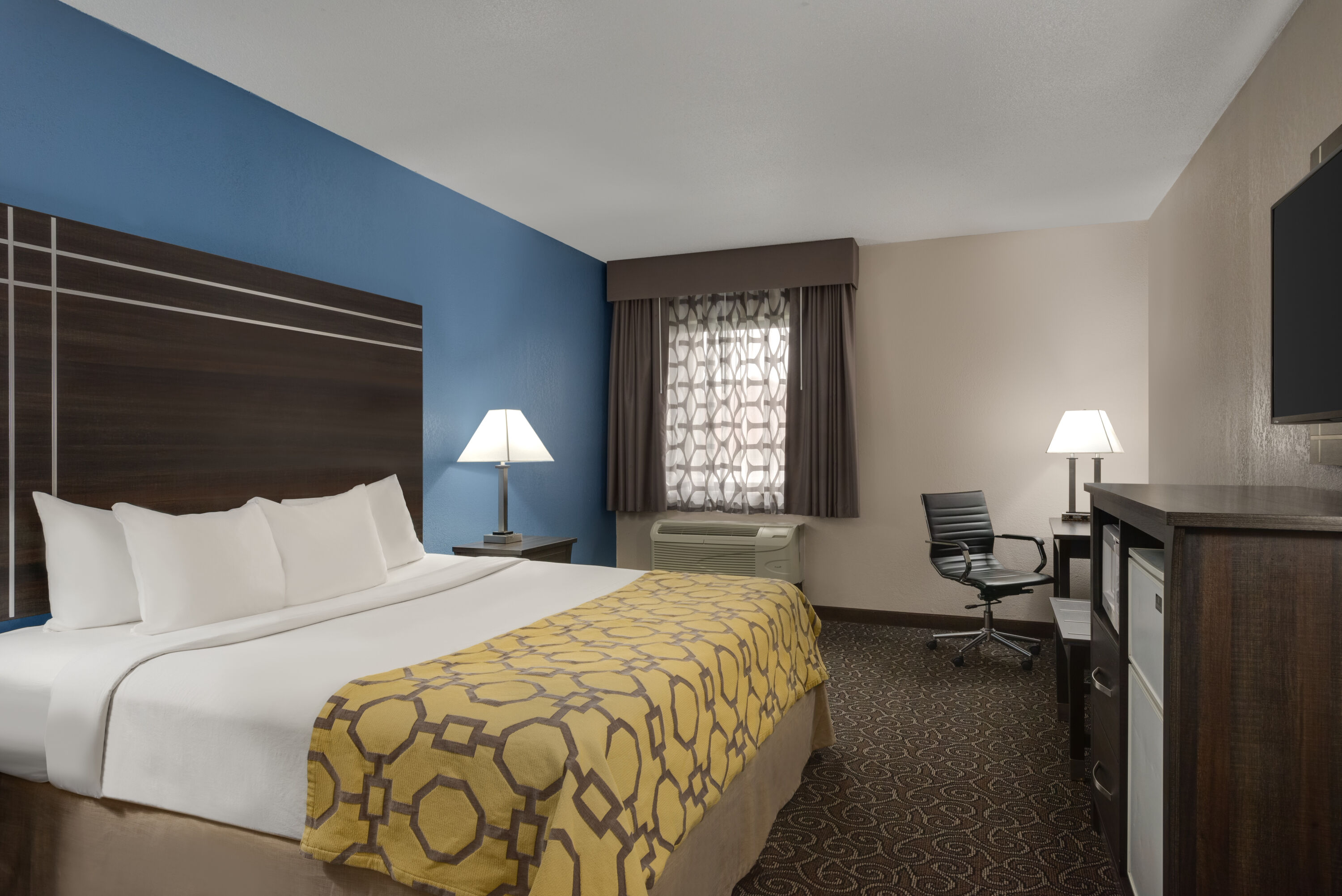 Guest room at the Baymont by Wyndham Muncie Near Ball State University in Muncie, Indiana