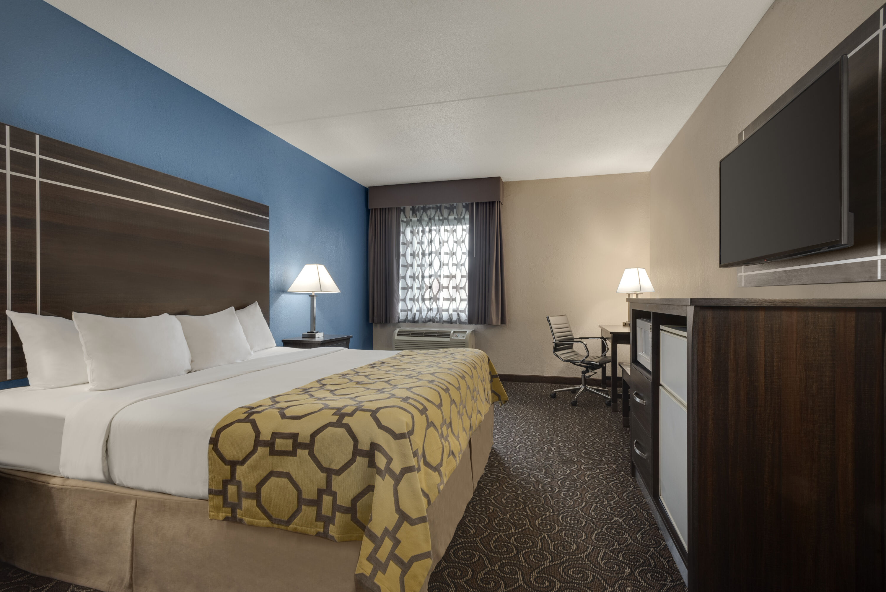 Guest room at the Baymont by Wyndham Muncie Near Ball State University in Muncie, Indiana