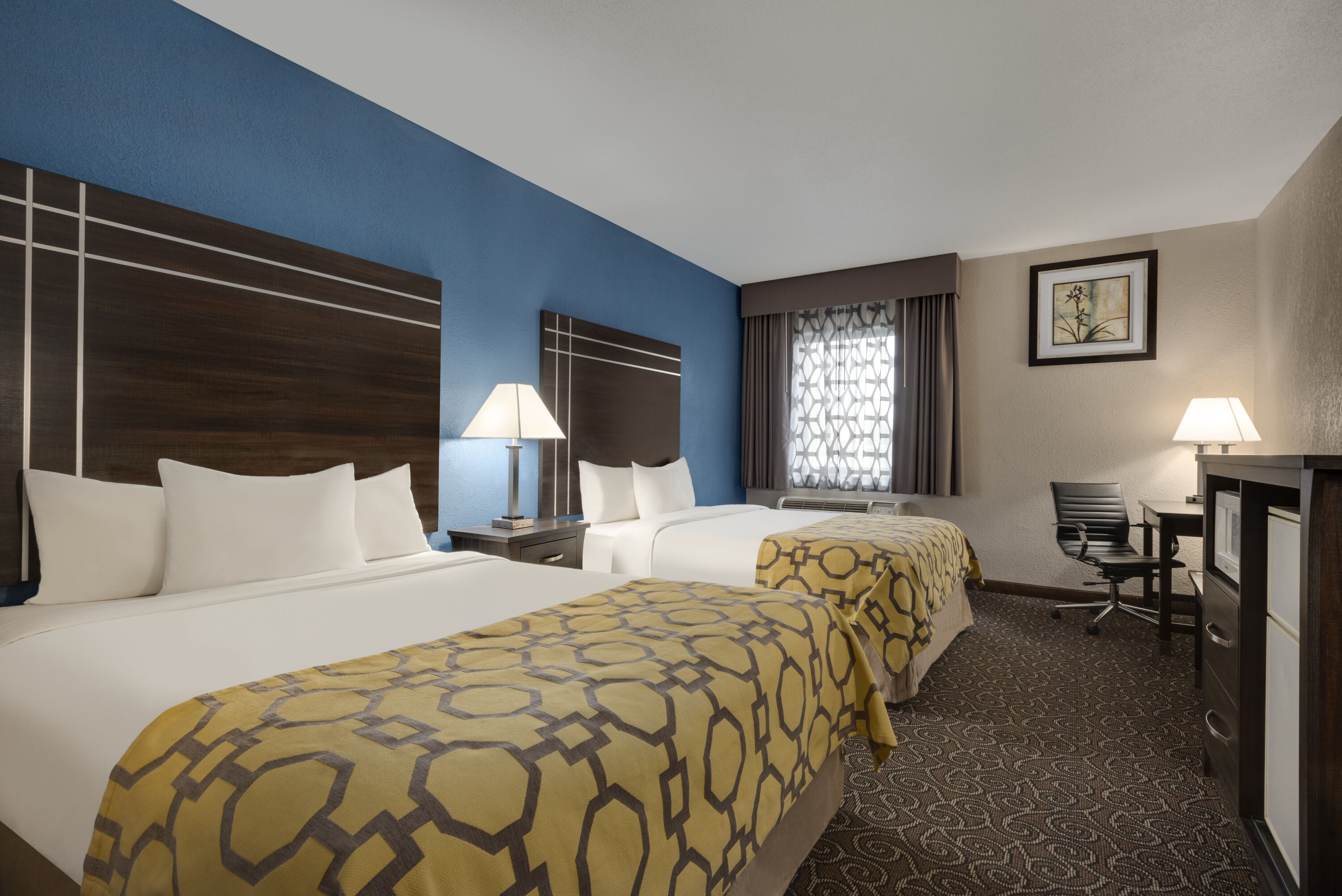 Guest room at the Baymont by Wyndham Muncie Near Ball State University in Muncie, Indiana