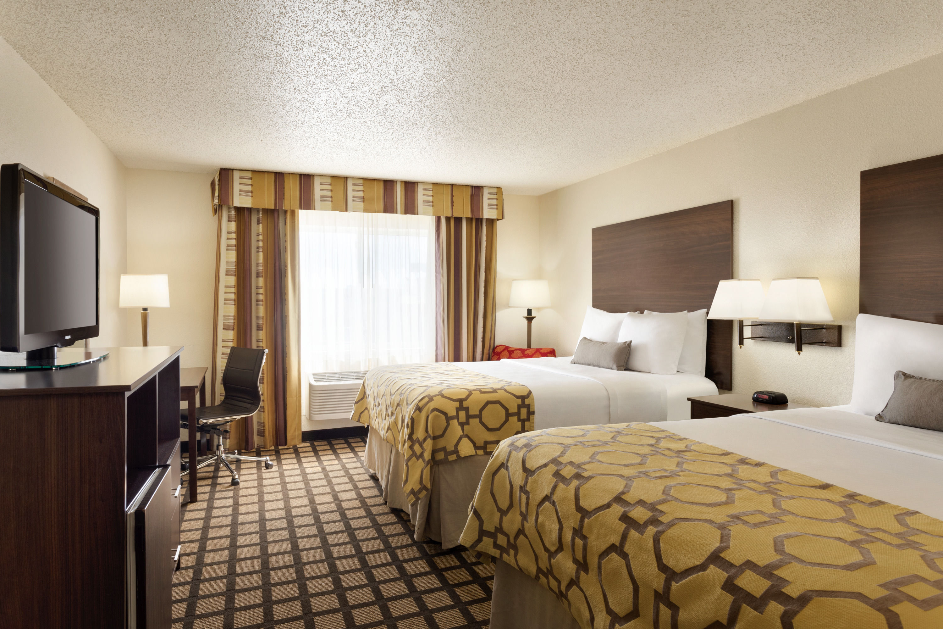 Guest room at the Baymont by Wyndham Salina in Salina, Kansas