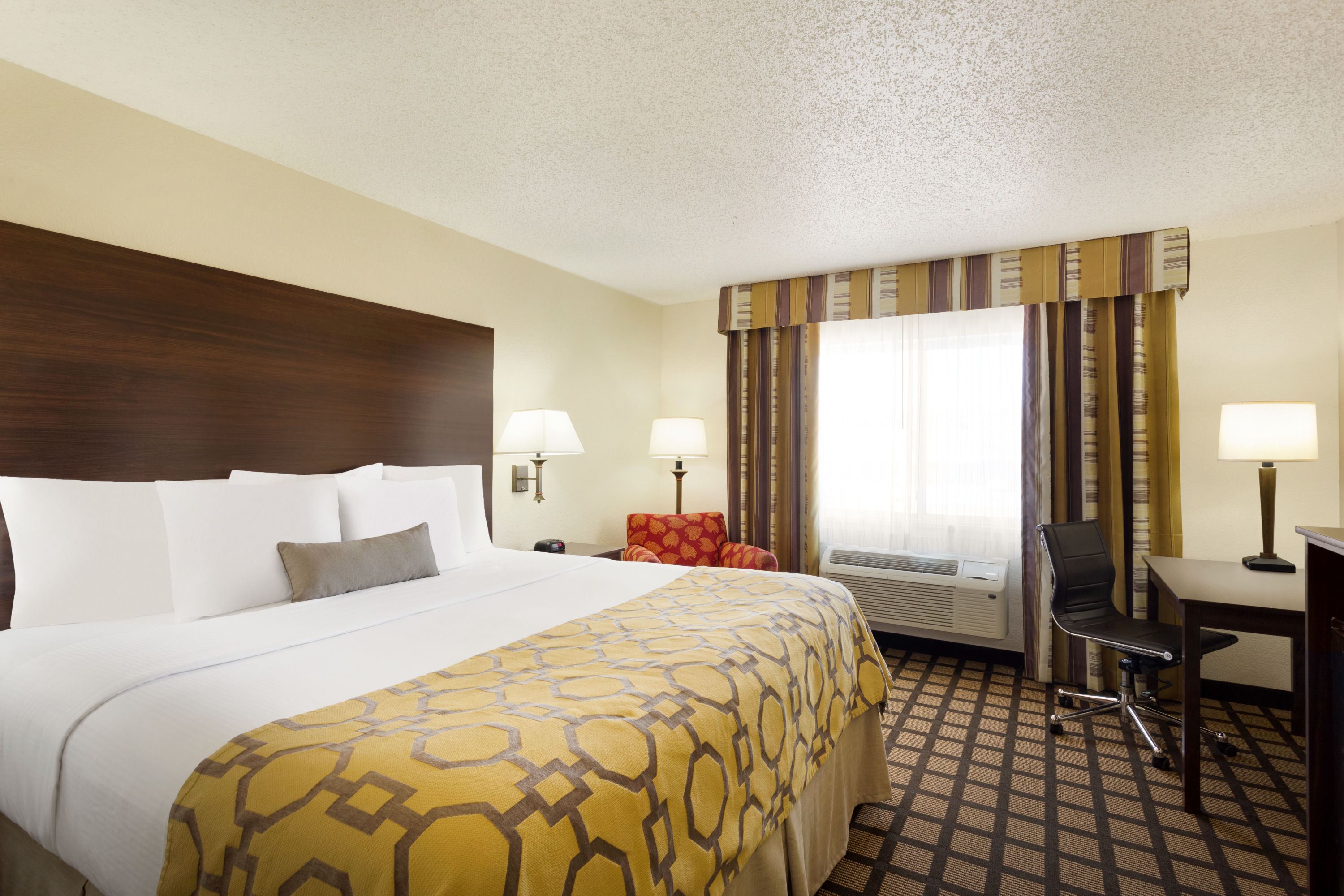 Guest room at the Baymont by Wyndham Salina in Salina, Kansas