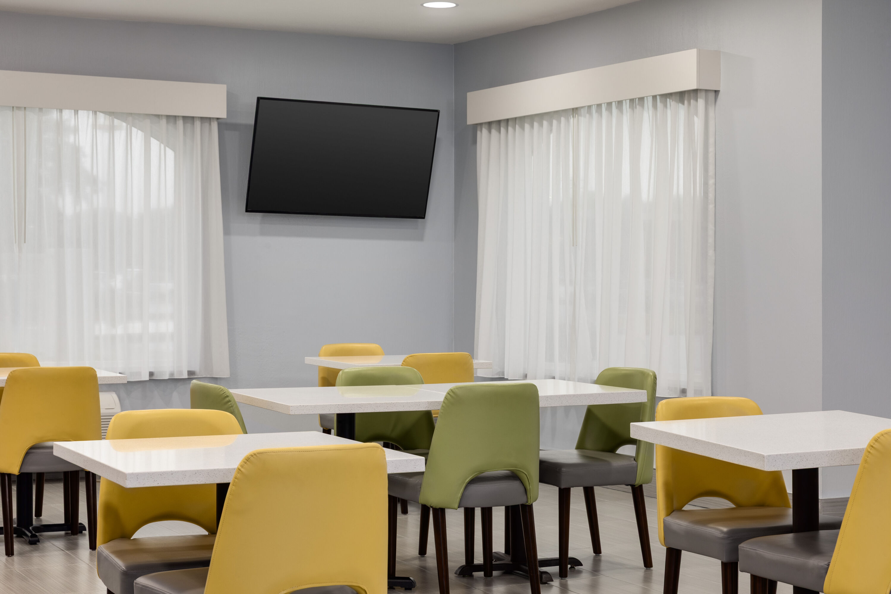 Baymont by Wyndham La Grange KY Southeast restaurant breakfast area with seating in La Grange, Kentucky