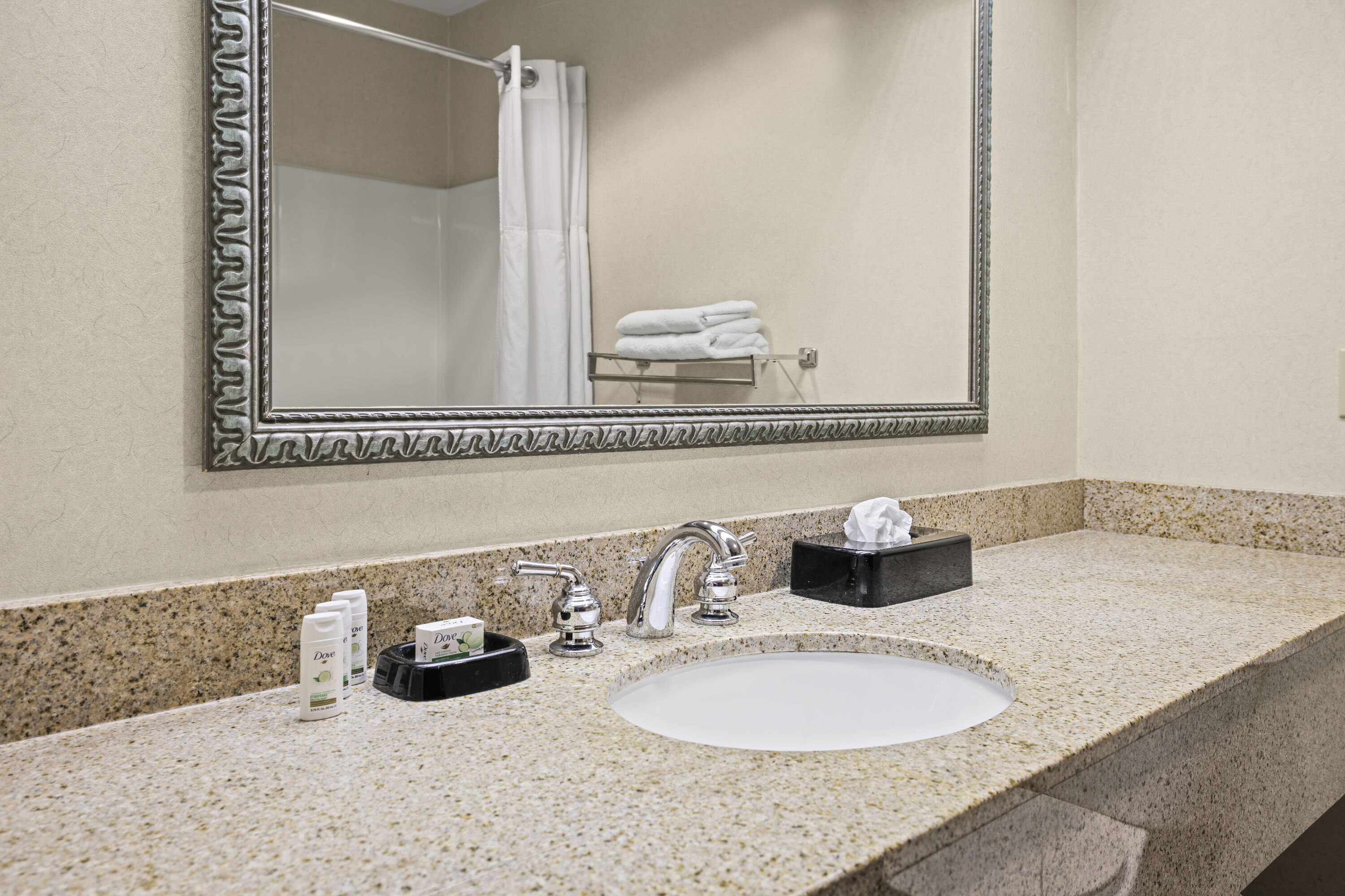 Guest room bath at the Baymont by Wyndham Madisonville in Madisonville, Kentucky