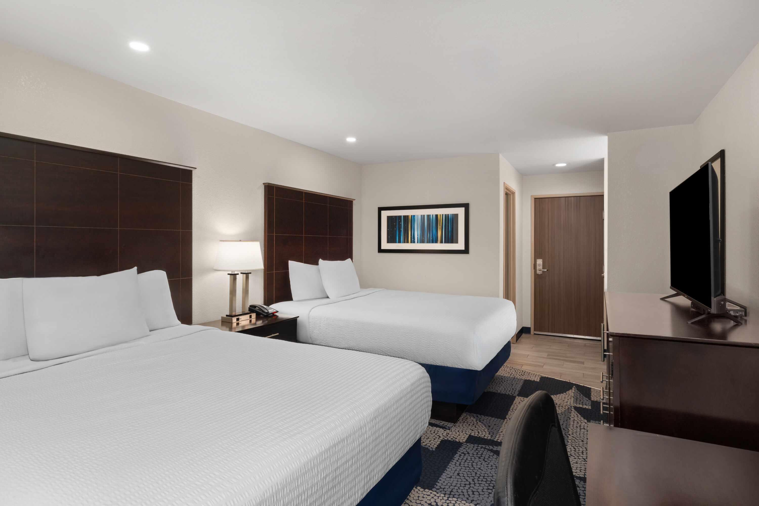 Guest room at the Baymont by Wyndham Iowa Lake Charles in Iowa, Louisiana