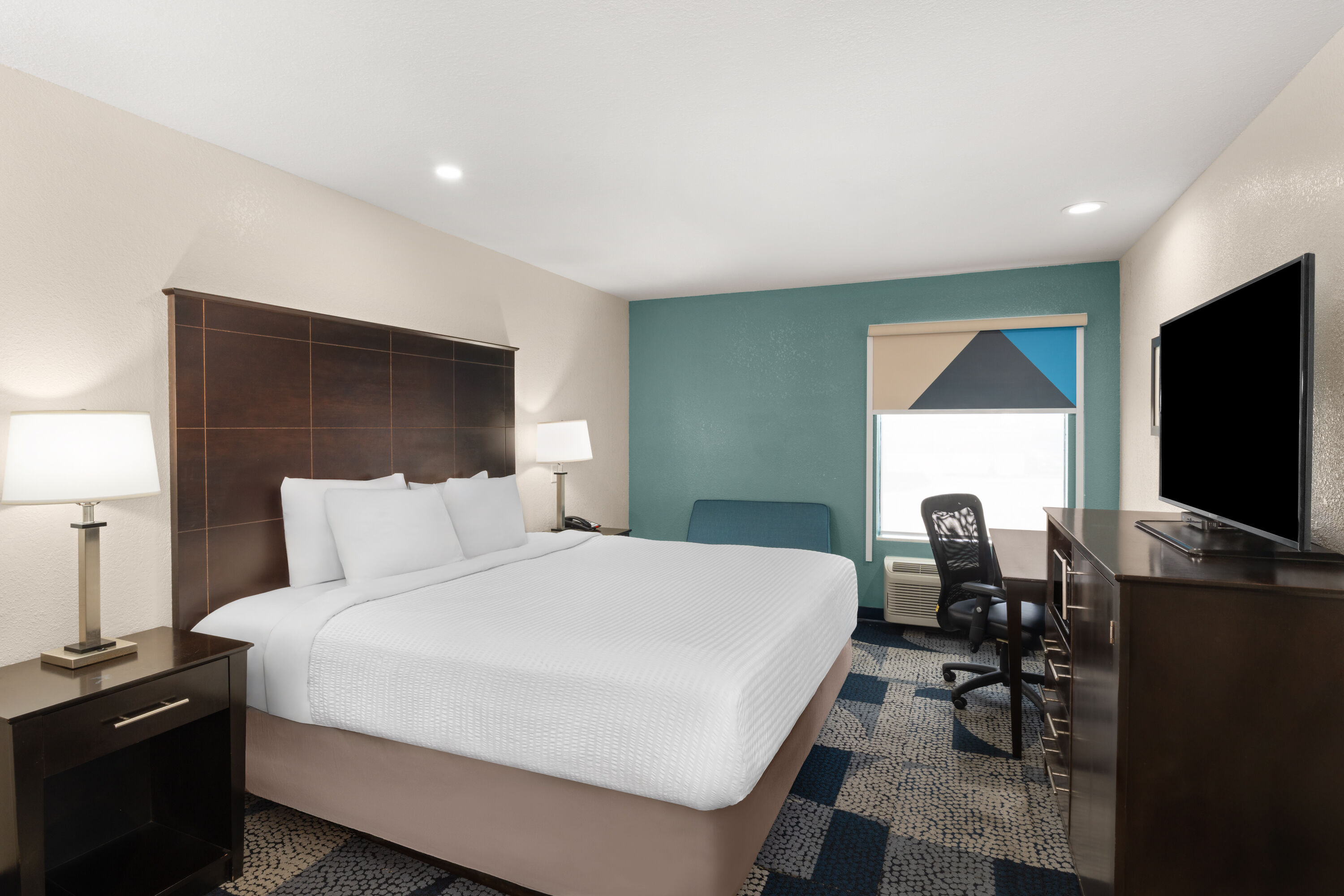 Guest room at the Baymont by Wyndham Iowa Lake Charles in Iowa, Louisiana