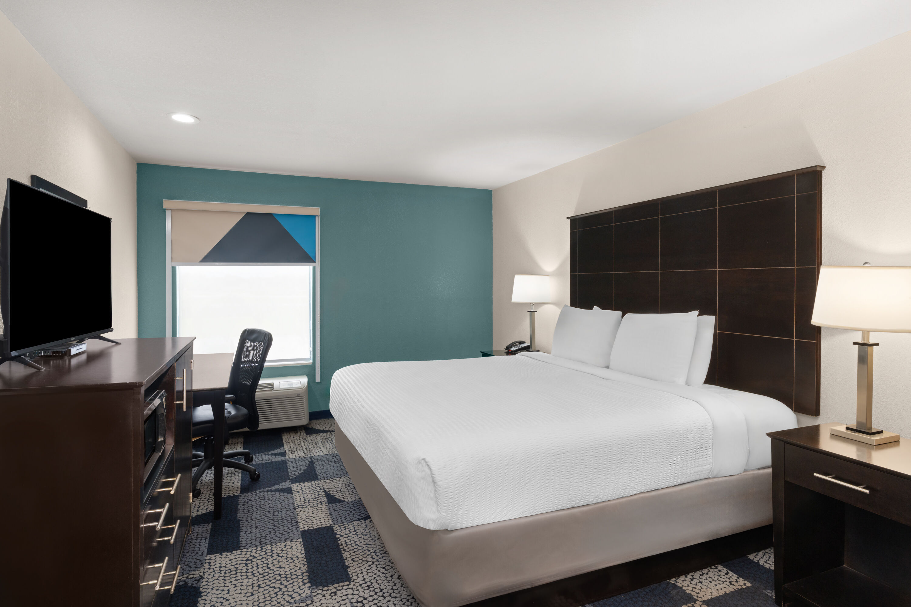 Guest room at the Baymont by Wyndham Iowa Lake Charles in Iowa, Louisiana
