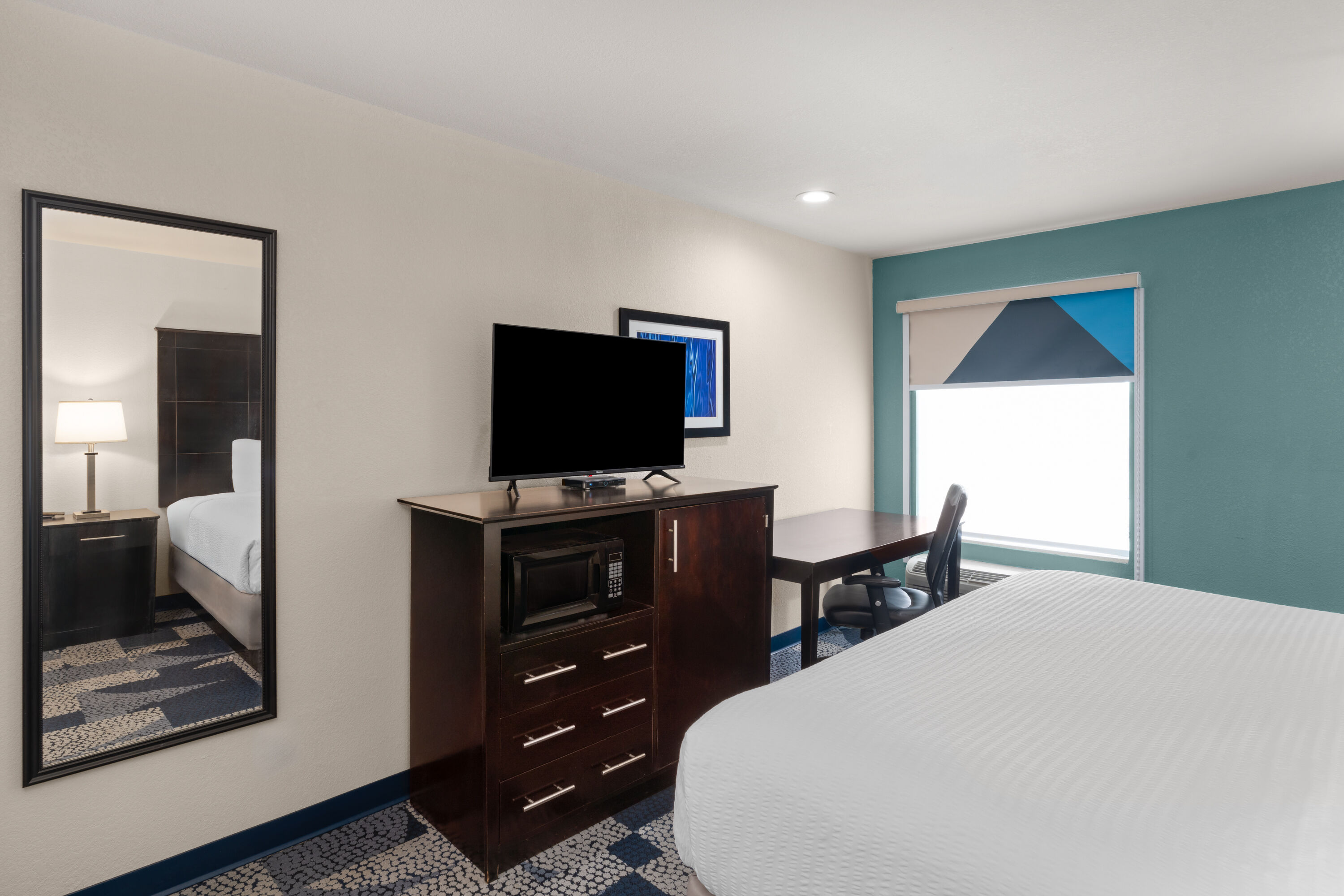 Guest room at the Baymont by Wyndham Iowa Lake Charles in Iowa, Louisiana