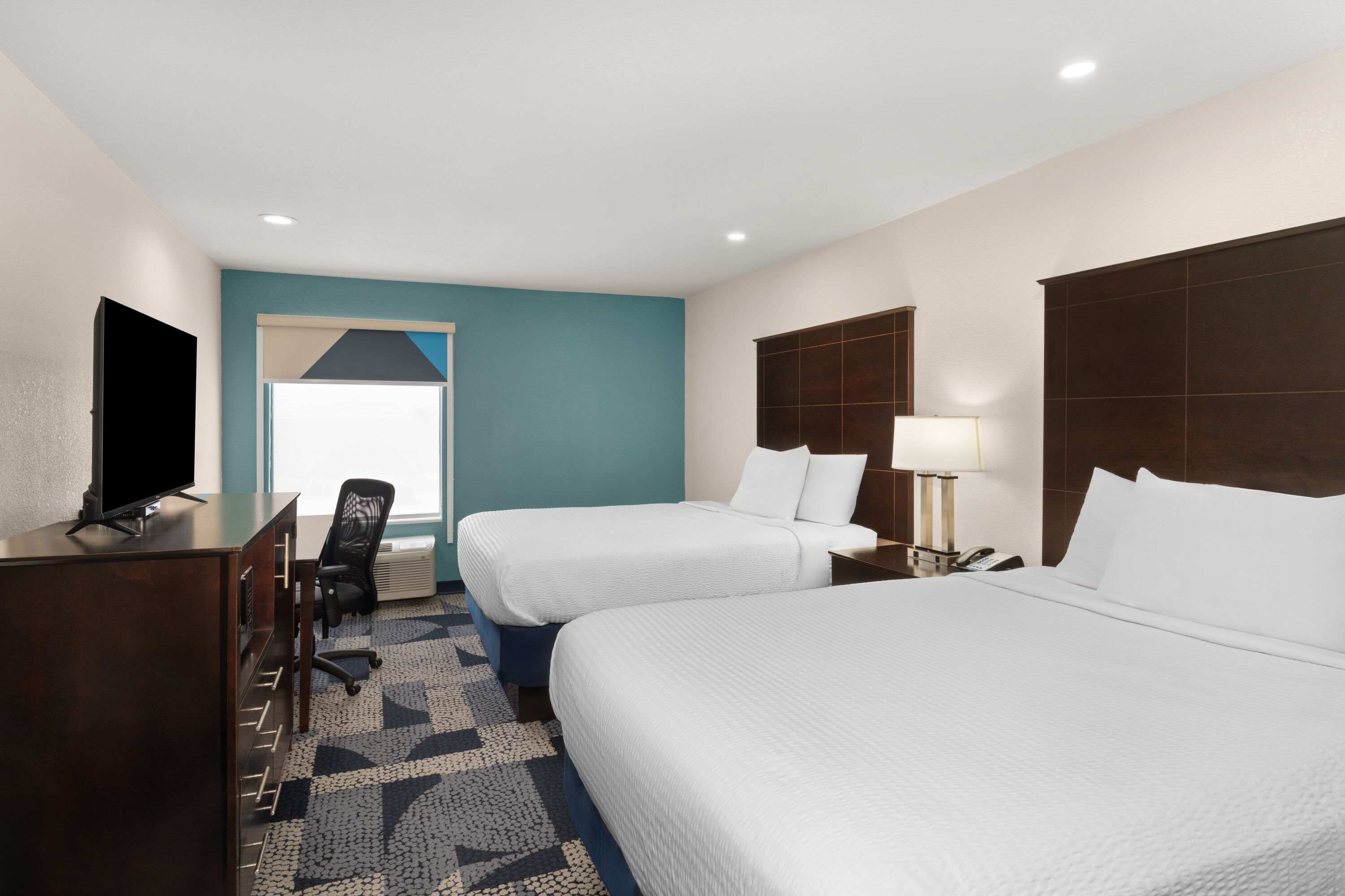 Guest room at the Baymont by Wyndham Iowa Lake Charles in Iowa, Louisiana
