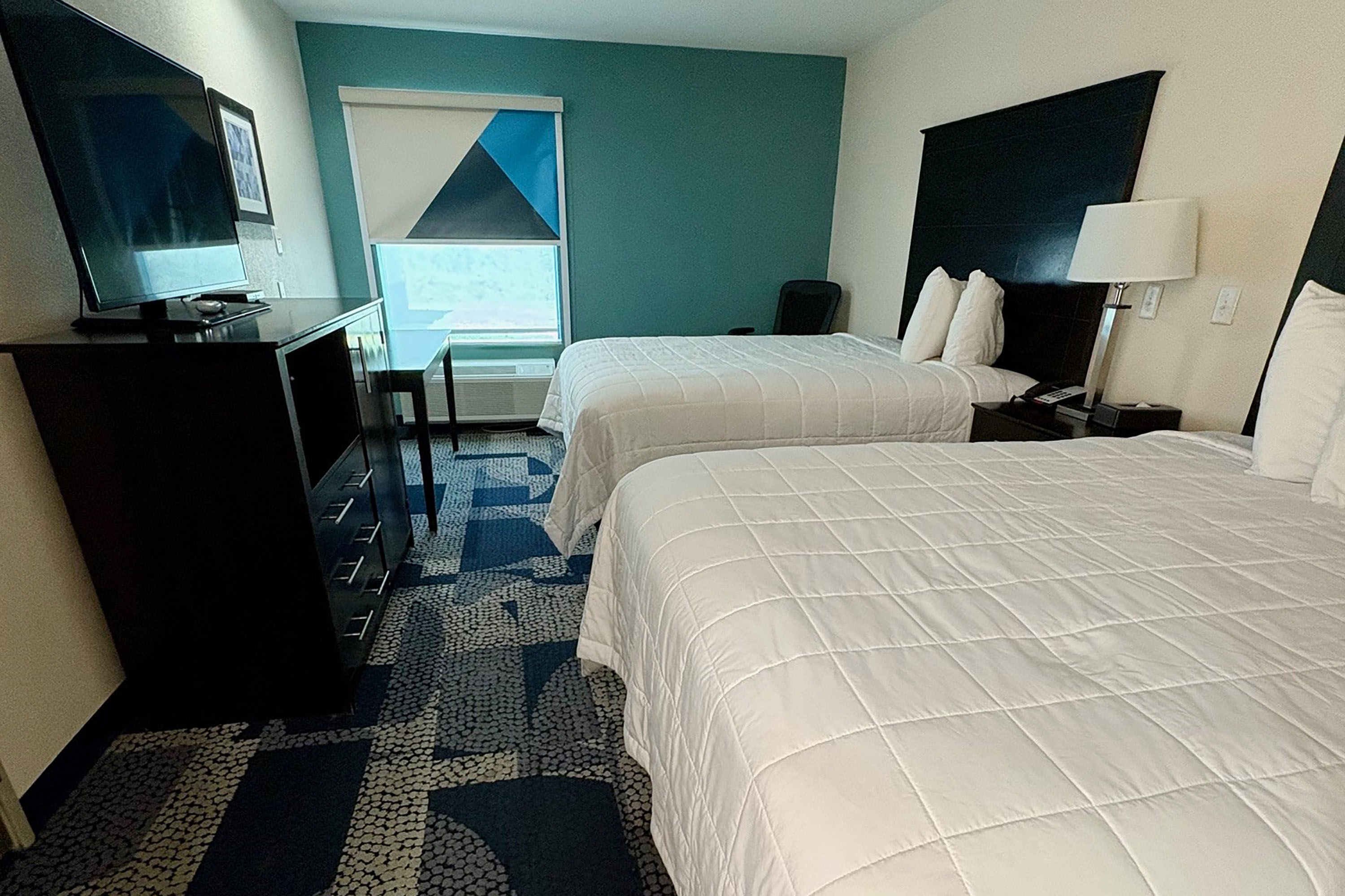 Guest room at the Baymont by Wyndham Iowa Lake Charles in Iowa, Louisiana