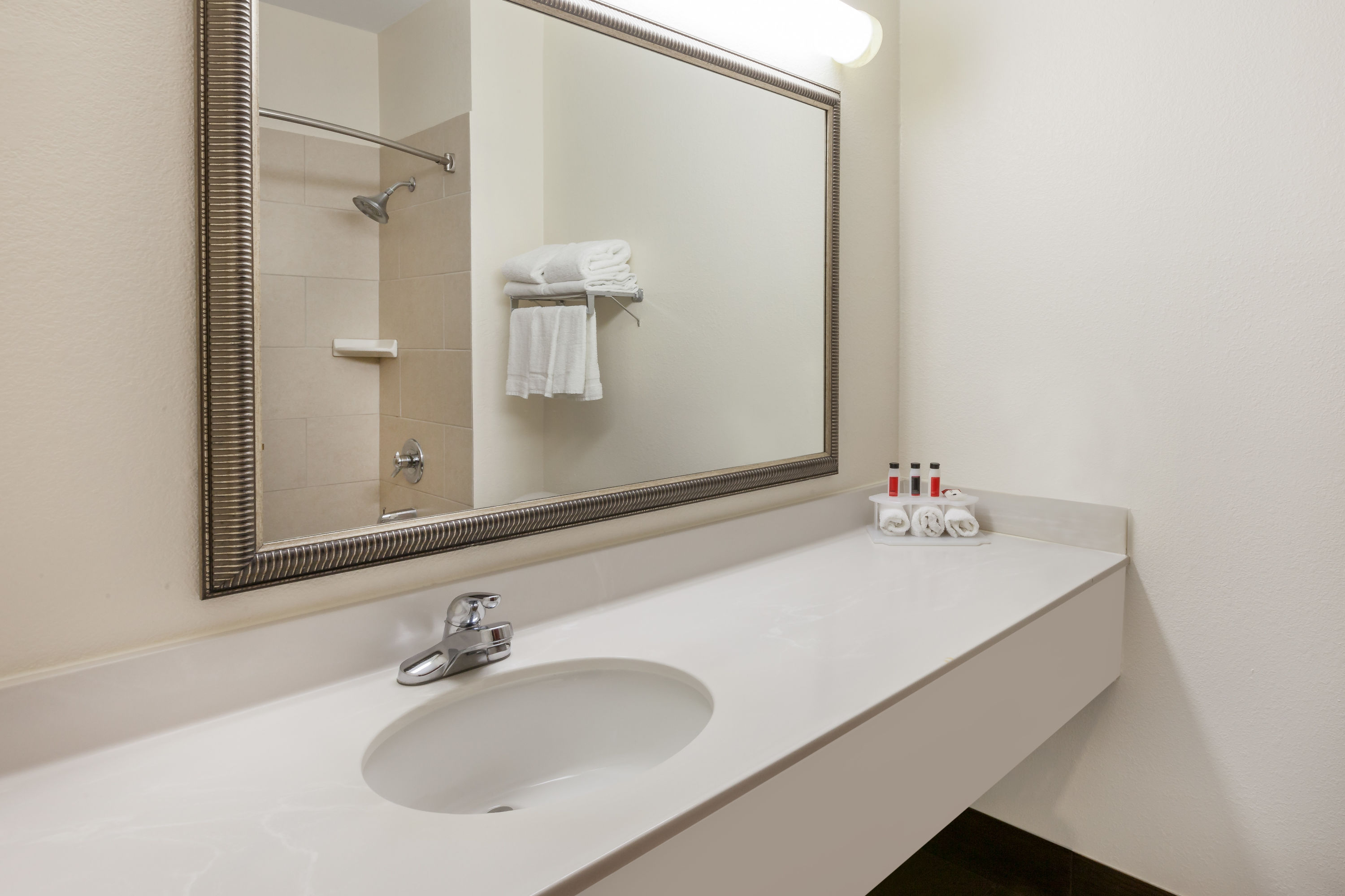 Guest room bath at the Baymont by Wyndham Chelsea in Chelsea, Michigan