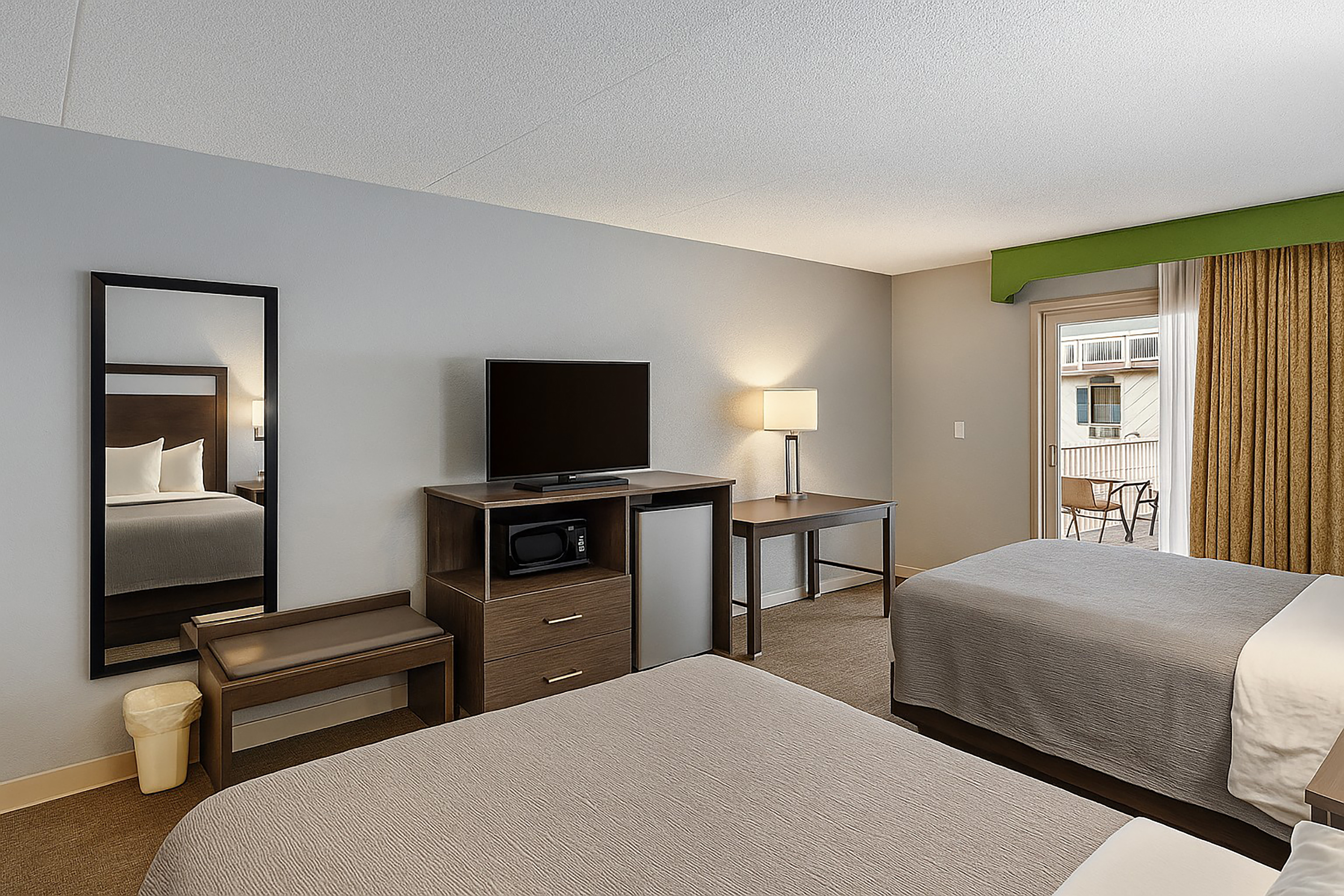 Guest room at the Baymont by Wyndham Coldwater in Coldwater, Michigan