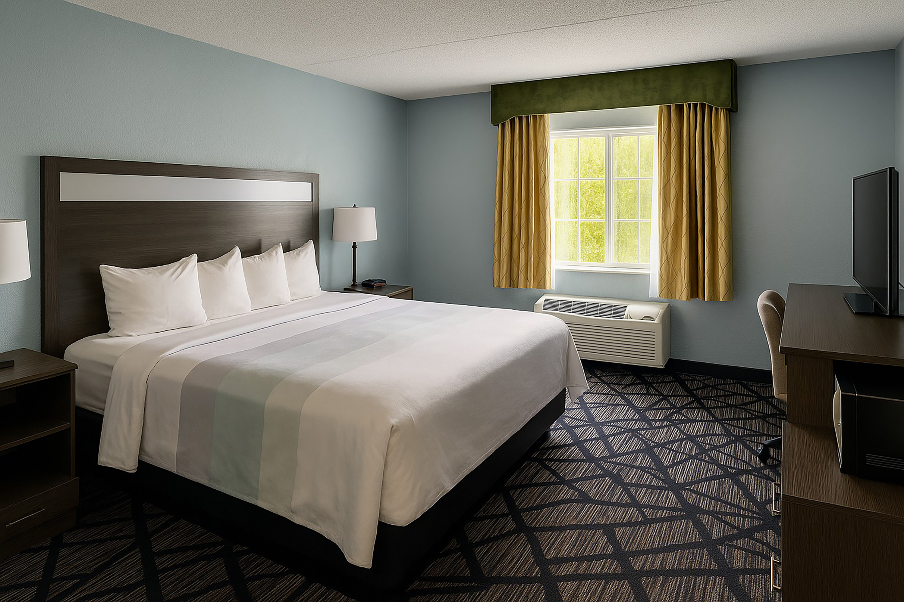 Guest room at the Baymont by Wyndham Coldwater in Coldwater, Michigan