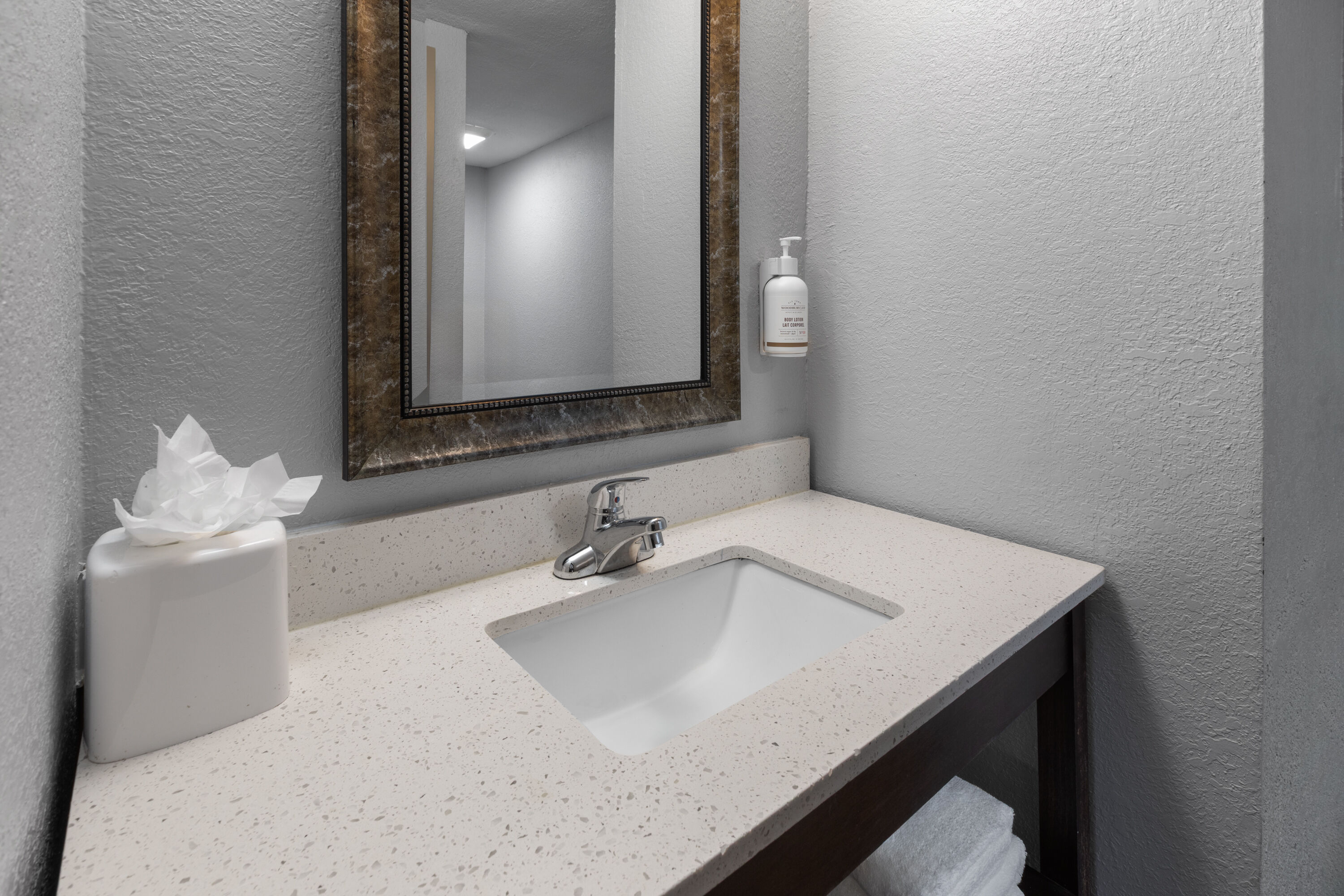 Guest room bath at the Baymont by Wyndham Downtown Detroit in Detroit, Michigan