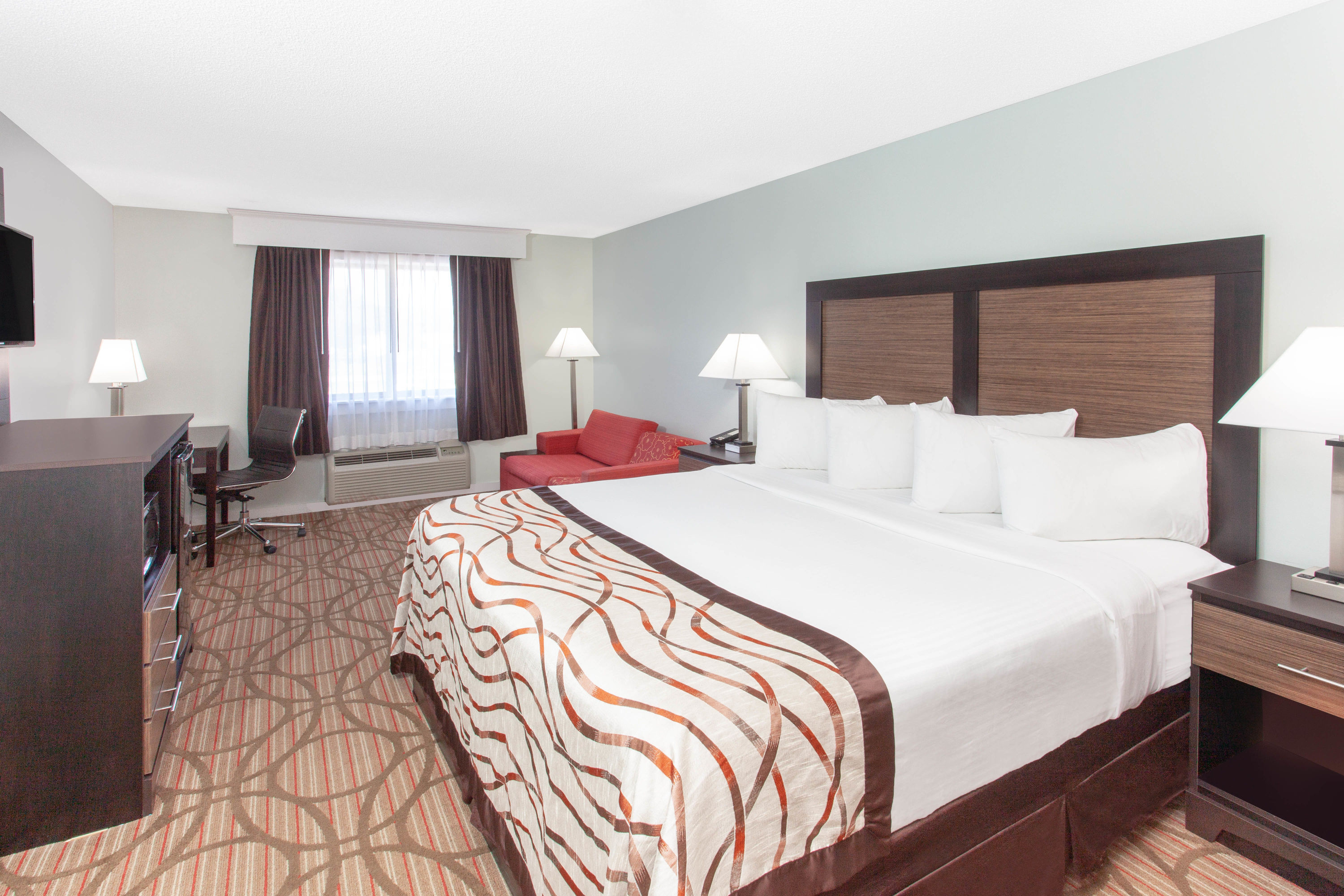 Guest room at the Baymont by Wyndham Grand Haven in Grand Haven, Michigan