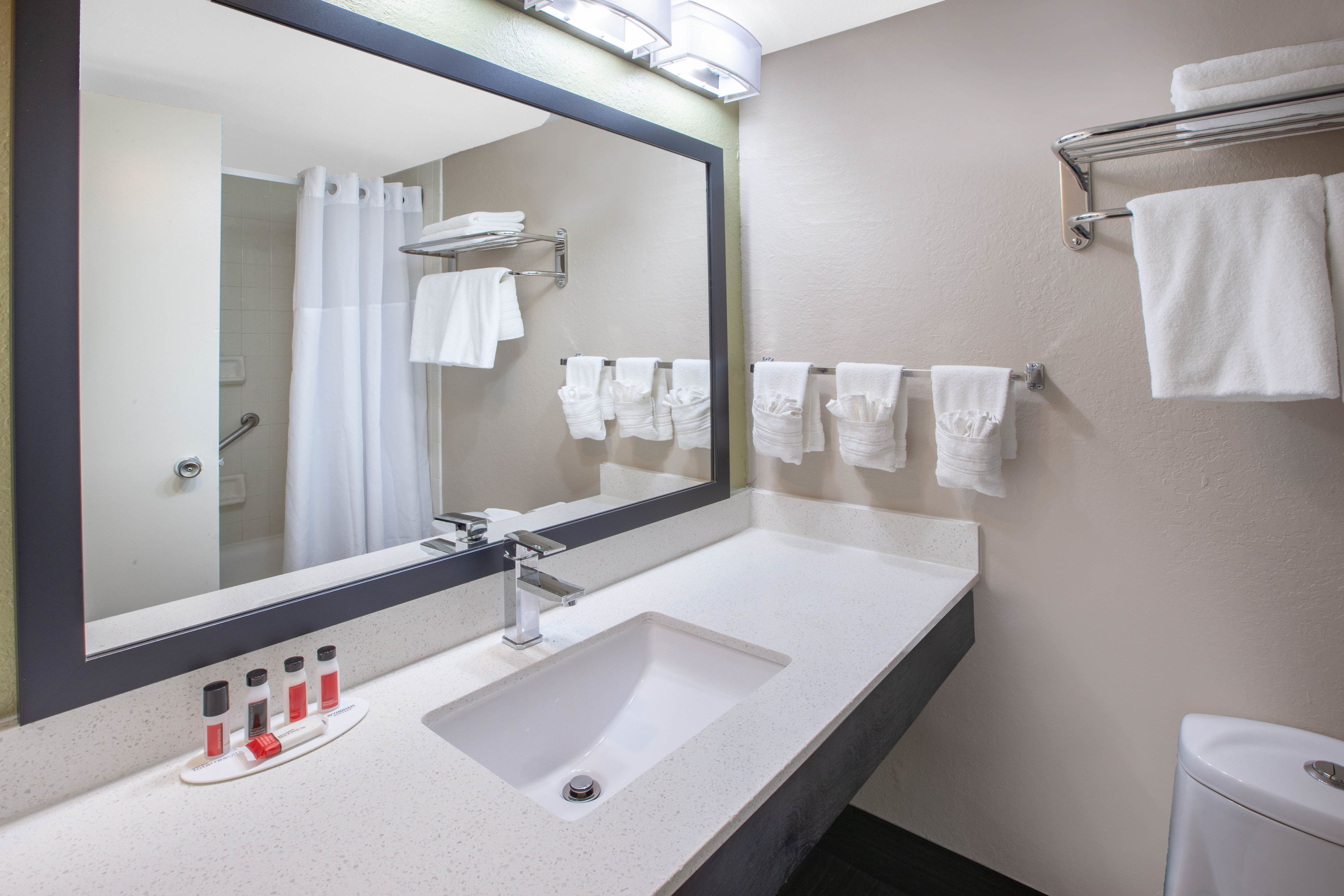 Guest room bath at the Baymont by Wyndham Grand Rapids Near Downtown in Grand Rapids, Michigan