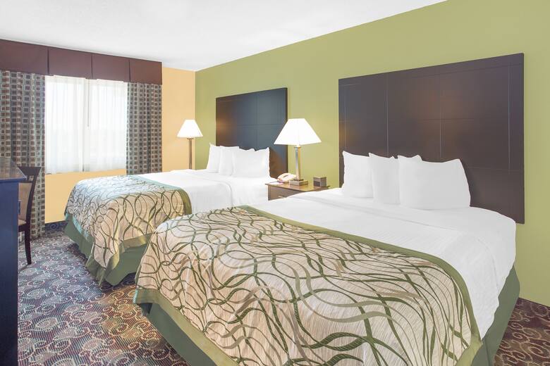 Guest room at the Baymont Inn & Suites Holland in Holland, Michigan