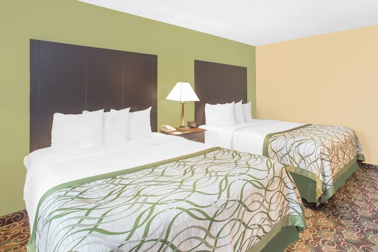 Guest room at the Baymont Inn & Suites Holland in Holland, Michigan